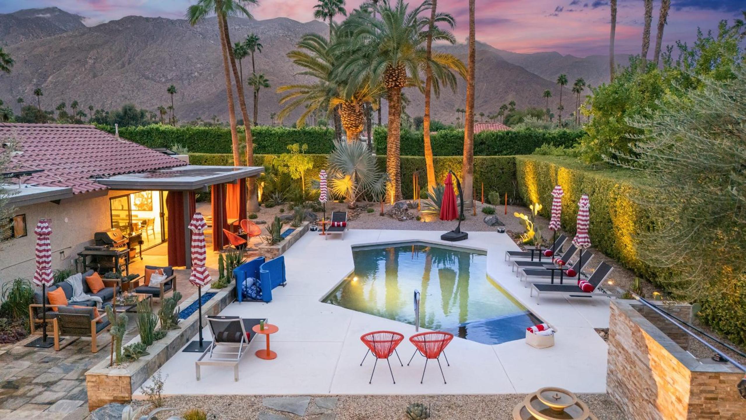 Design-forward Palm Springs home w saltwater pool lush yard multiple outdoor dining areas Casa Papagayo by AvantStay