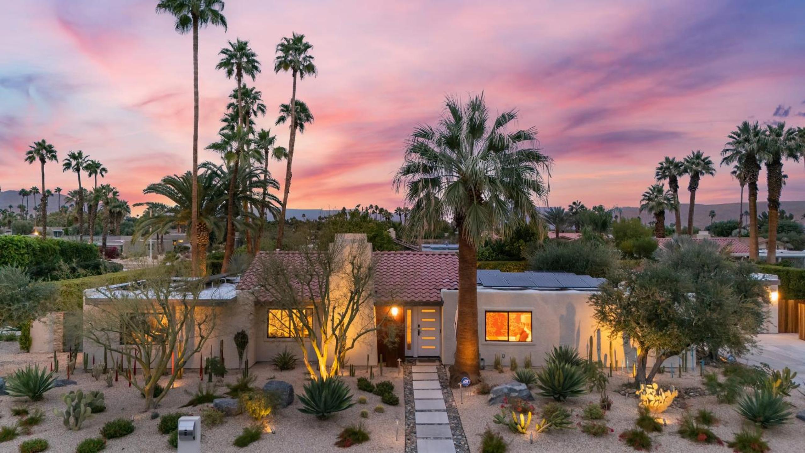 Design-forward Palm Springs home w saltwater pool lush yard multiple outdoor dining areas Casa Papagayo by AvantStay