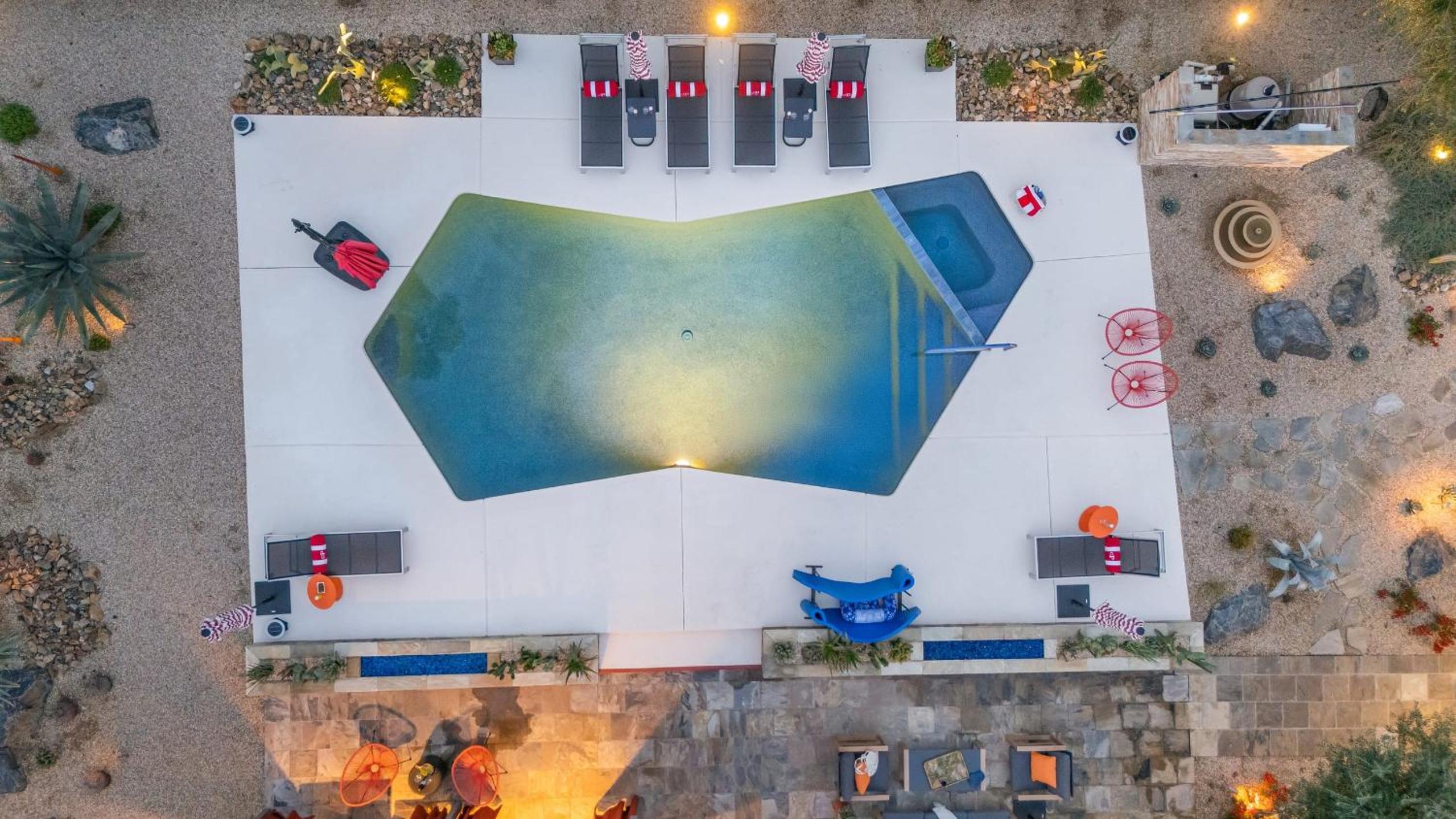 Design-forward Palm Springs home w saltwater pool lush yard multiple outdoor dining areas Casa Papagayo by AvantStay