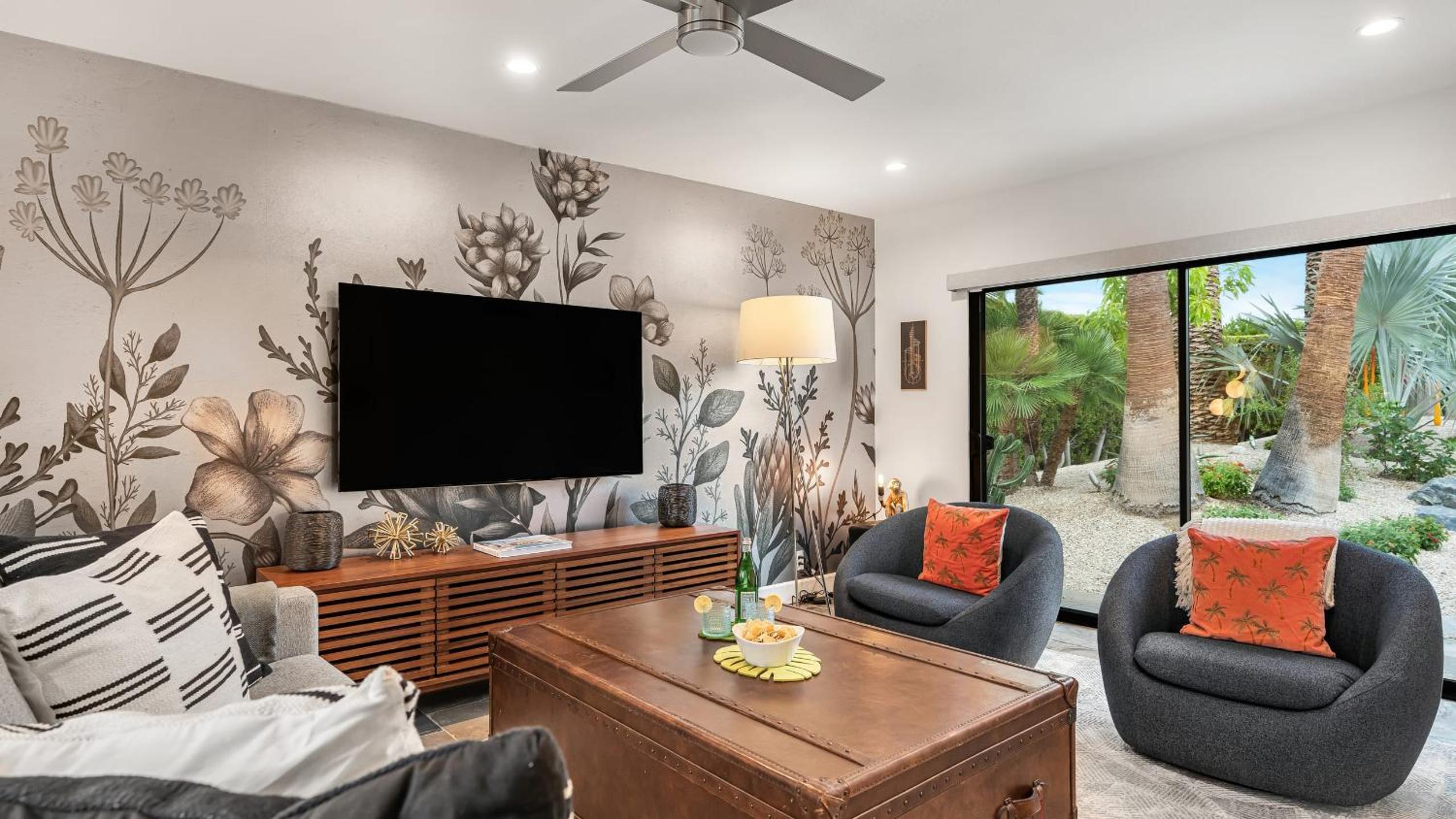 Design-forward Palm Springs home w saltwater pool lush yard multiple outdoor dining areas Casa Papagayo by AvantStay