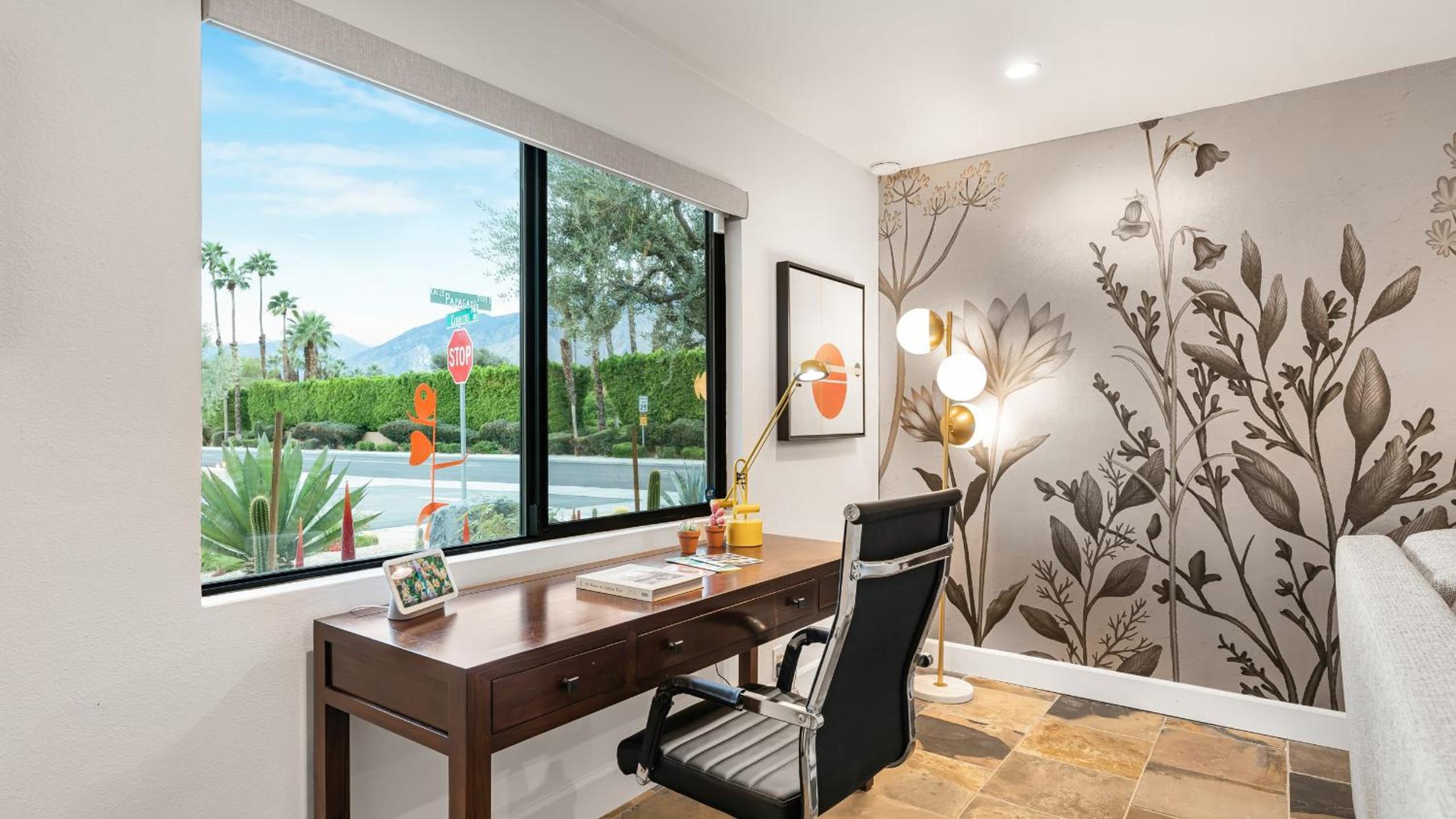 Design-forward Palm Springs home w saltwater pool lush yard multiple outdoor dining areas Casa Papagayo by AvantStay