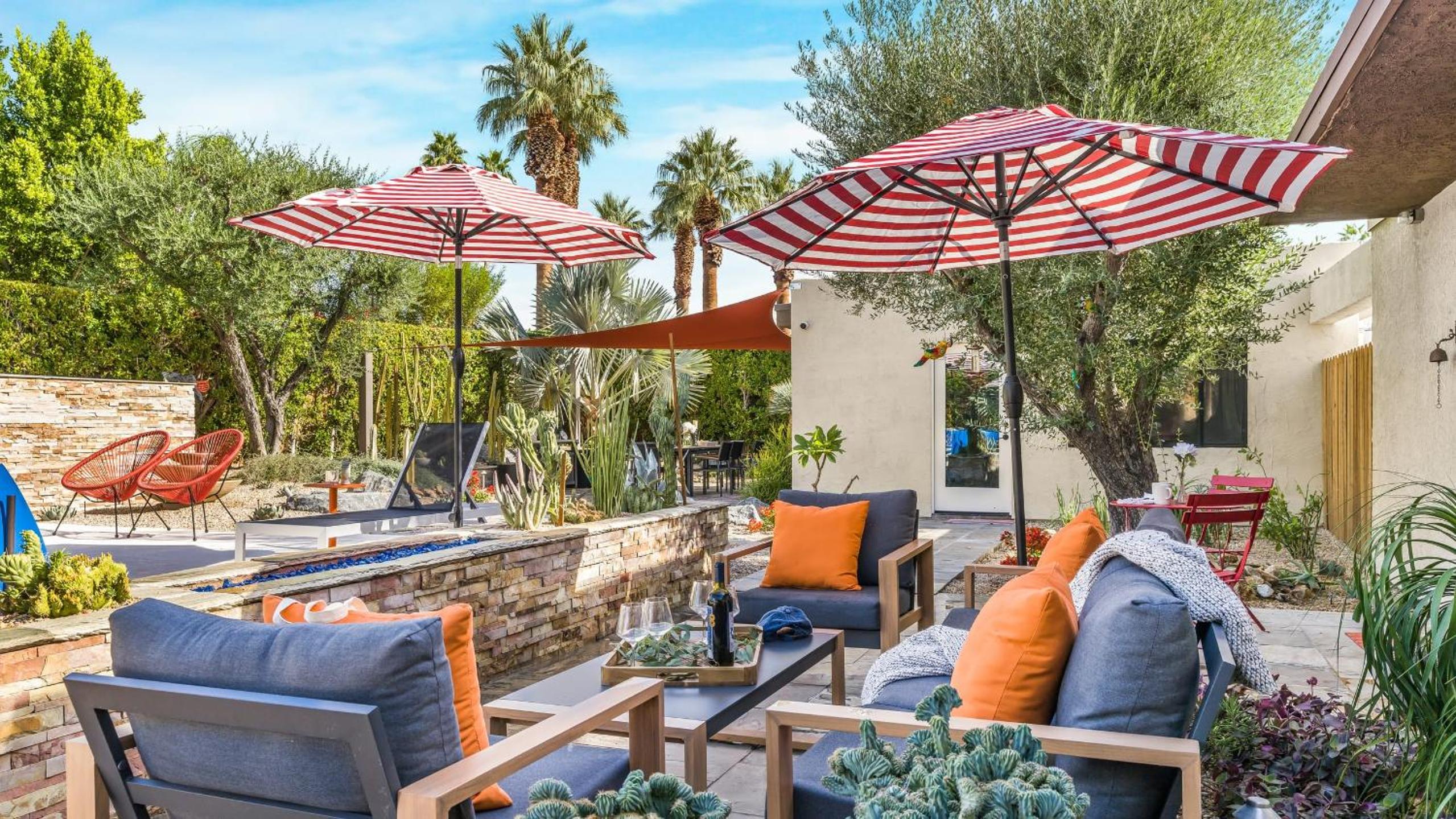 Design-forward Palm Springs home w saltwater pool lush yard multiple outdoor dining areas Casa Papagayo by AvantStay