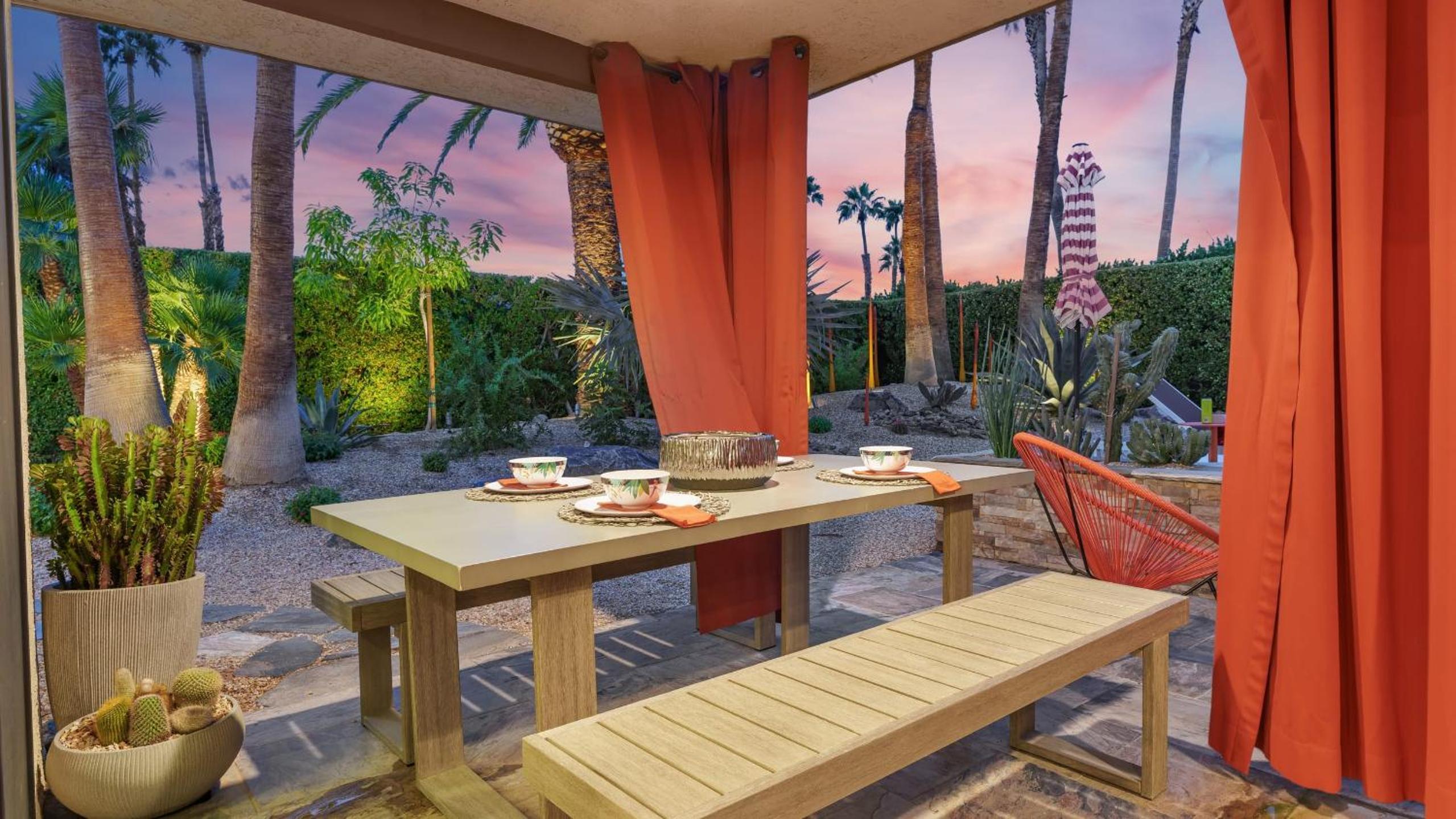 Design-forward Palm Springs home w saltwater pool lush yard multiple outdoor dining areas Casa Papagayo by AvantStay