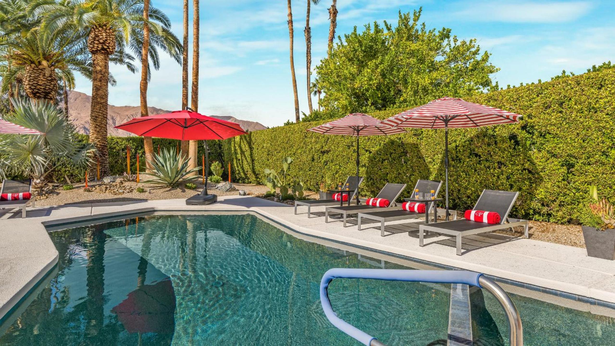 Design-forward Palm Springs home w saltwater pool lush yard multiple outdoor dining areas Casa Papagayo by AvantStay