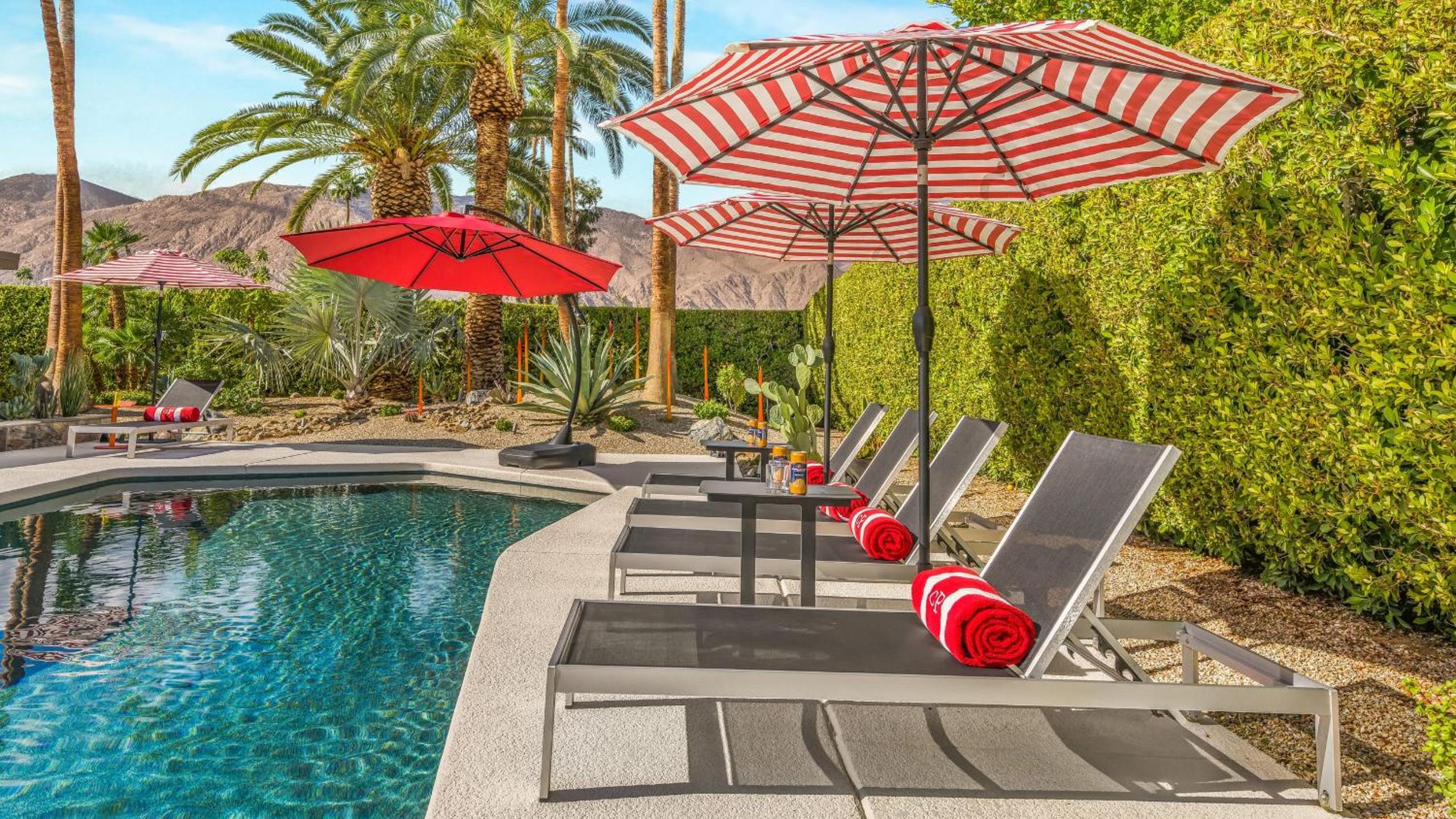 Design-forward Palm Springs home w saltwater pool lush yard multiple outdoor dining areas Casa Papagayo by AvantStay