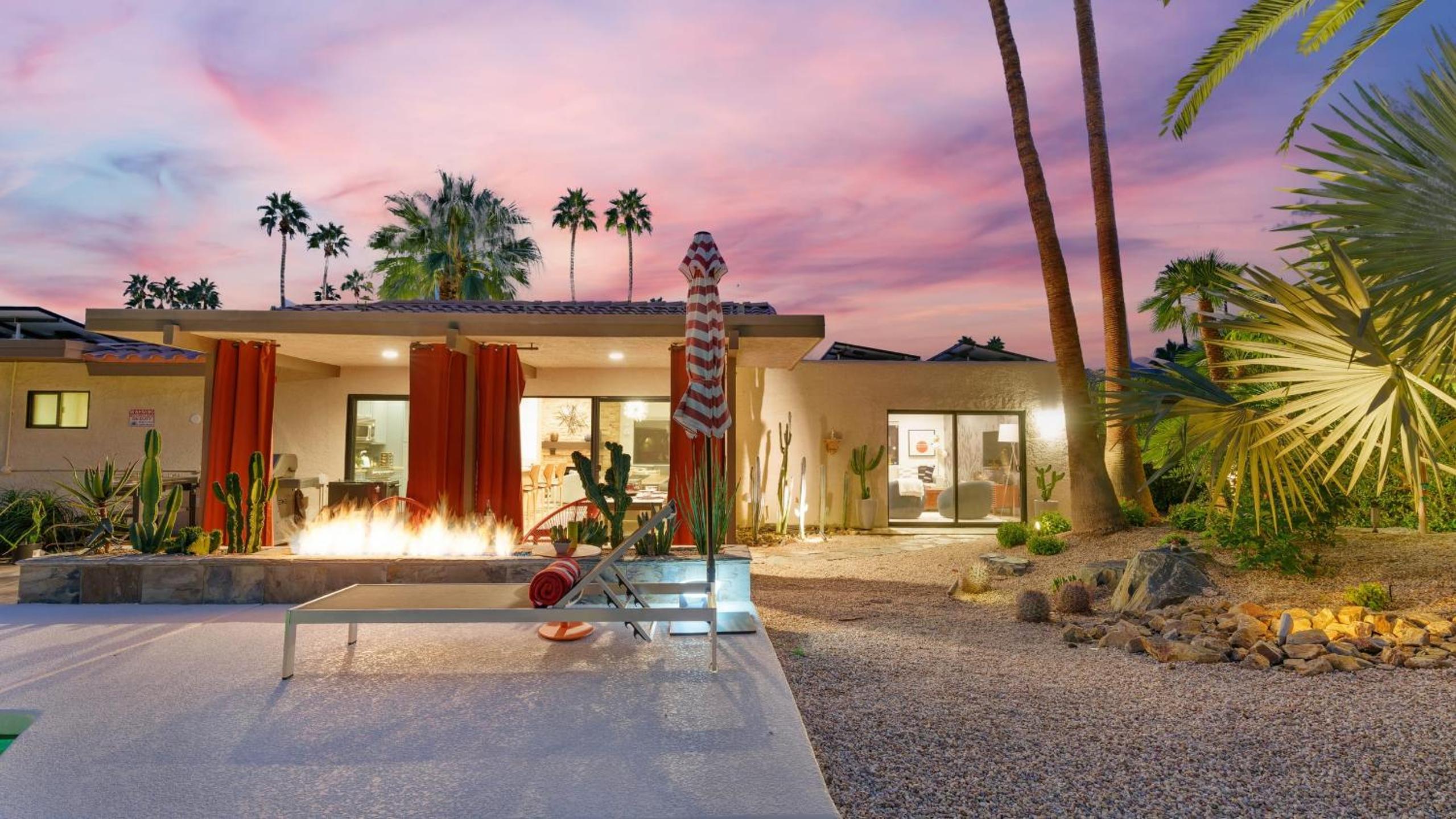 Design-forward Palm Springs home w saltwater pool lush yard multiple outdoor dining areas Casa Papagayo by AvantStay