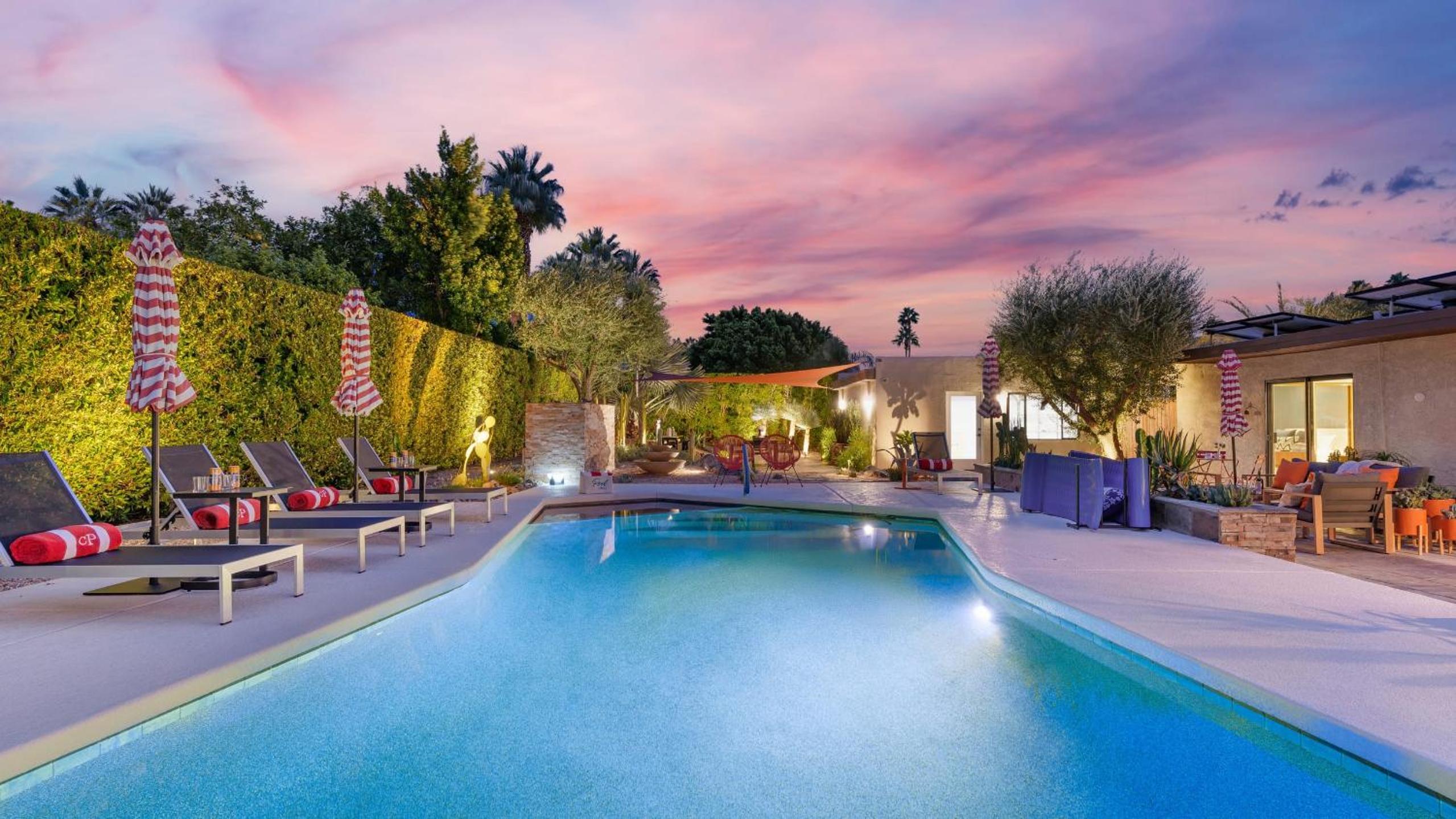 Design-forward Palm Springs home w saltwater pool lush yard multiple outdoor dining areas Casa Papagayo by AvantStay