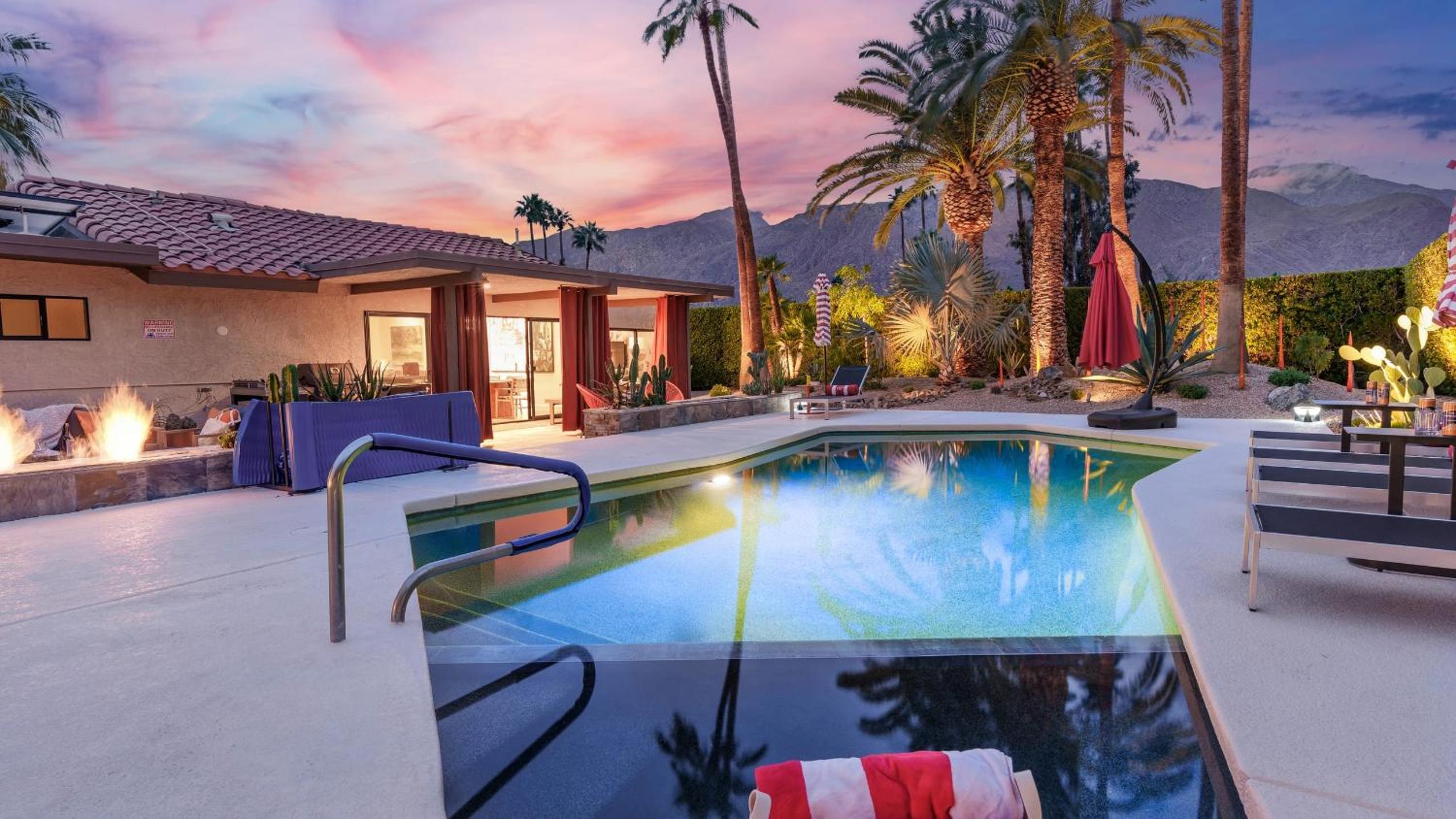 Design-forward Palm Springs home w saltwater pool lush yard multiple outdoor dining areas Casa Papagayo by AvantStay