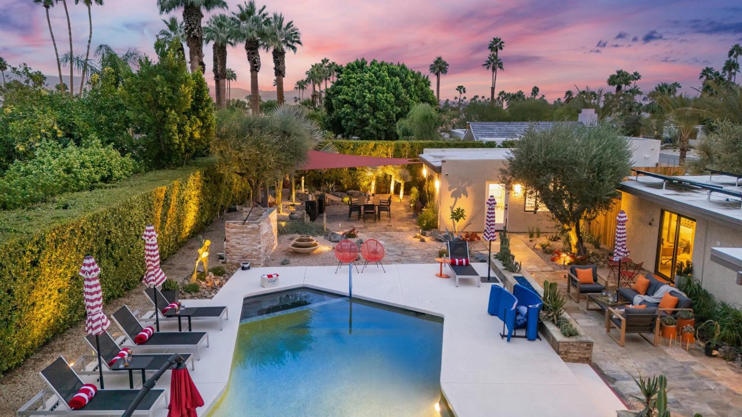 Design-forward Palm Springs home w saltwater pool lush yard multiple outdoor dining areas Casa Papagayo by AvantStay
