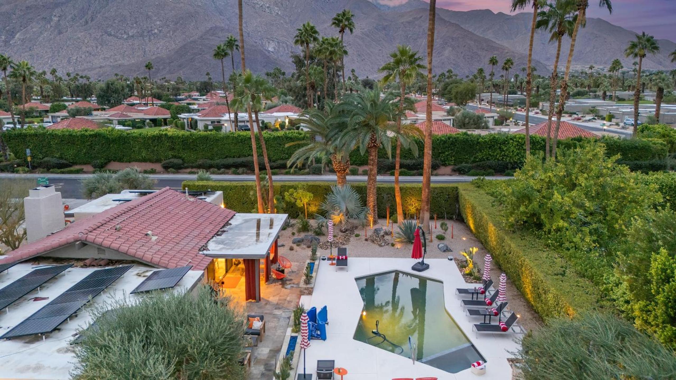 Design-forward Palm Springs home w saltwater pool lush yard multiple outdoor dining areas Casa Papagayo by AvantStay
