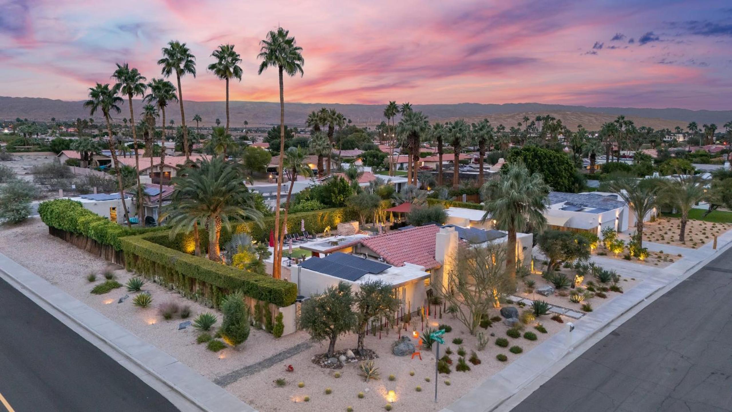 Design-forward Palm Springs home w saltwater pool lush yard multiple outdoor dining areas Casa Papagayo by AvantStay