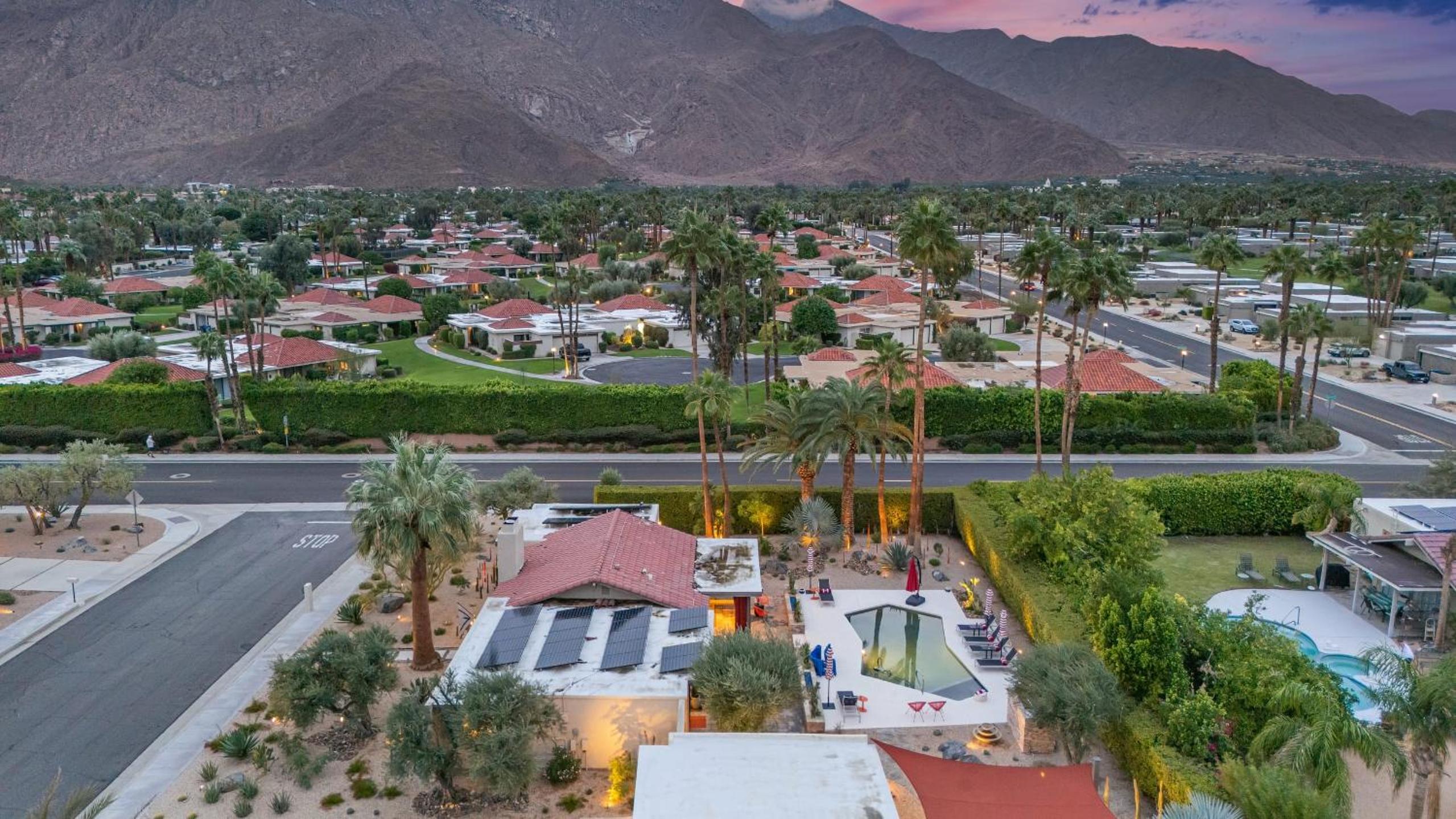 Design-forward Palm Springs home w saltwater pool lush yard multiple outdoor dining areas Casa Papagayo by AvantStay