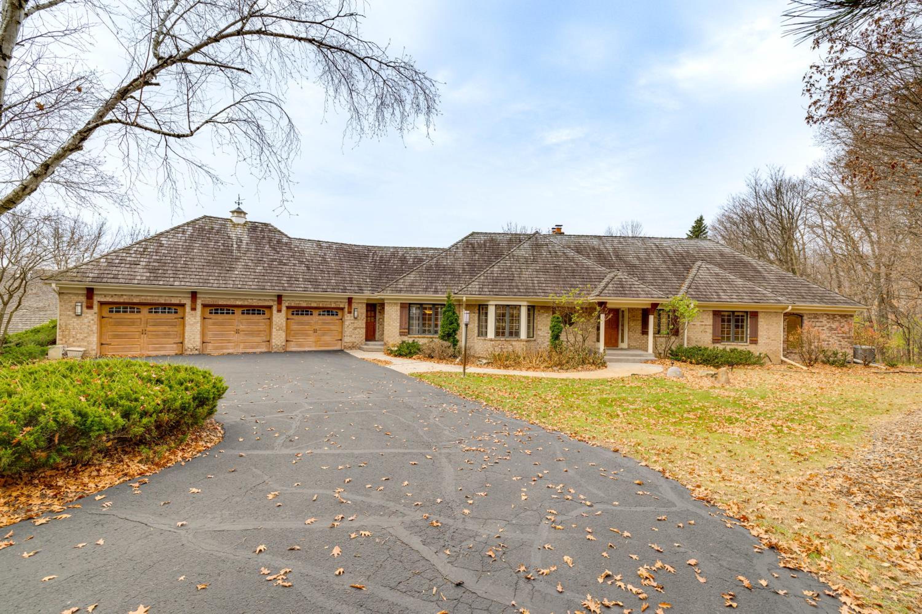 Luxe Long Lake Estate! Courts, Pool and Game Room