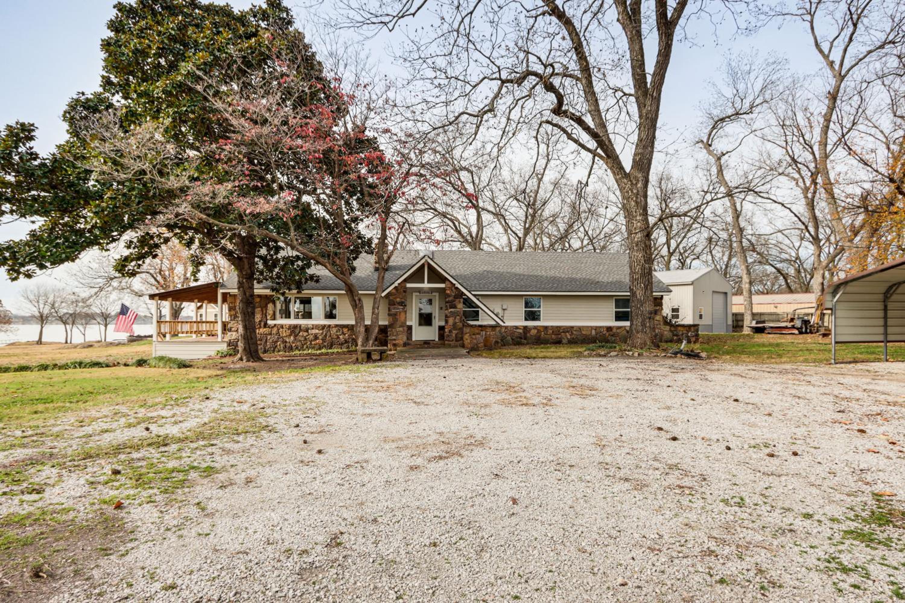 Deck and Yard Wolf Creek Waterfront Home in Grove!