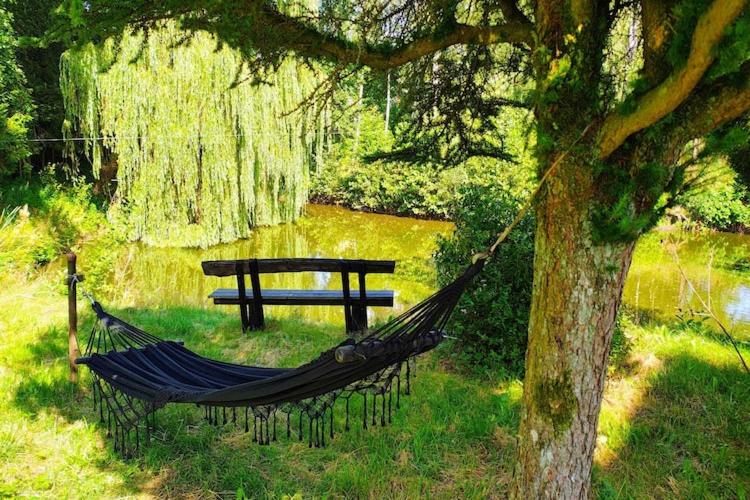 Half of a holiday home, huge garden, pond