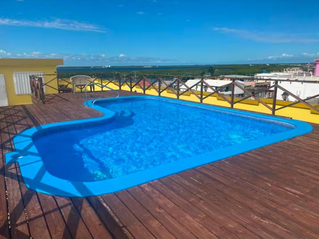 Paradise suites and residence with pool and balcony