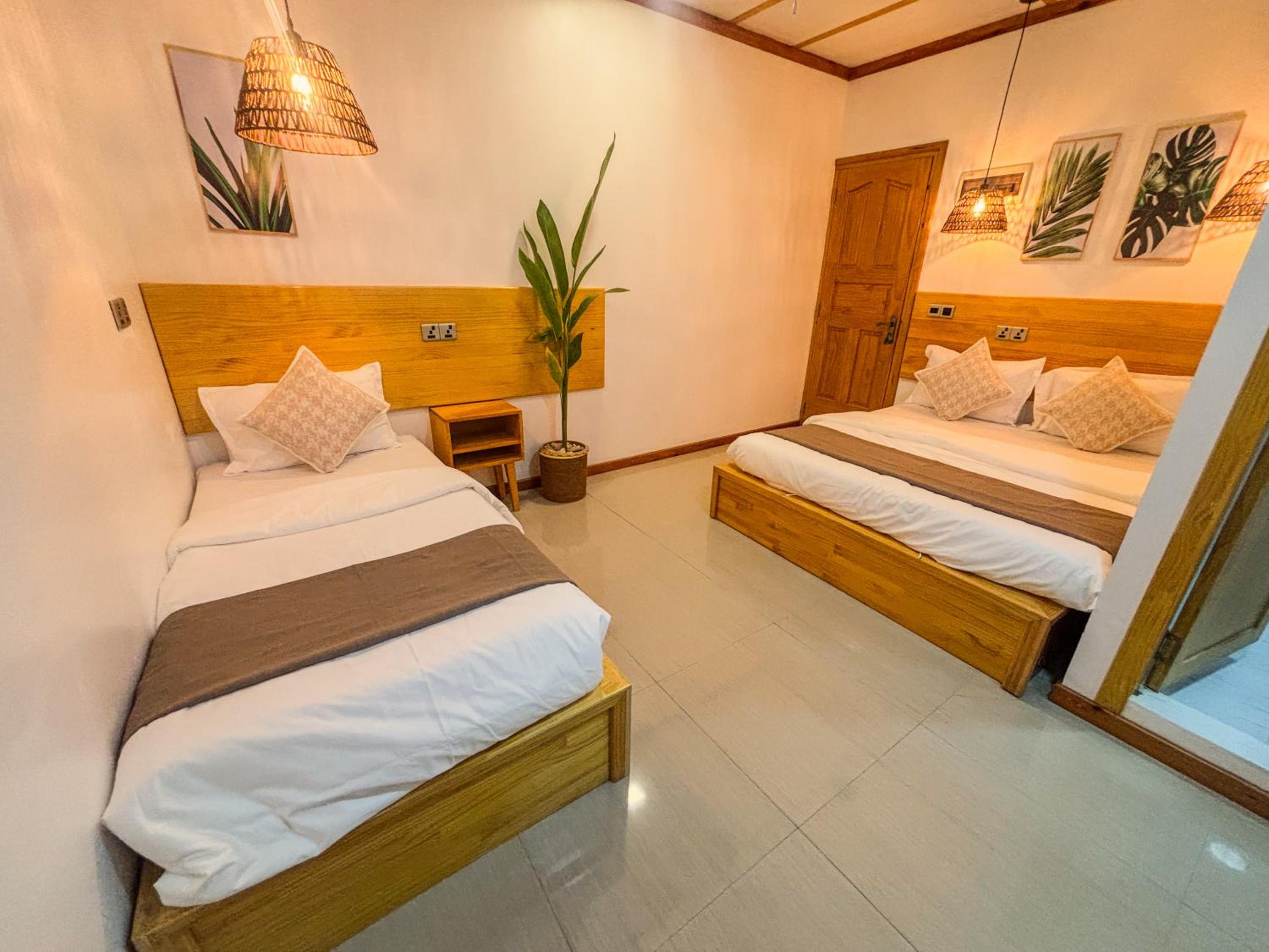 Eco Palm Mathiveri - Guest House with Complimentary Shared Kitchen & Laundry