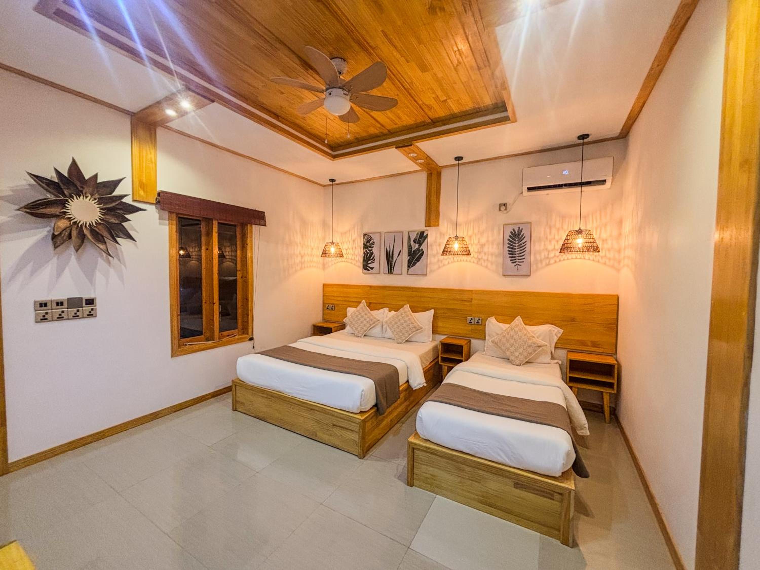 Eco Palm Mathiveri - Guest House with Complimentary Shared Kitchen & Laundry