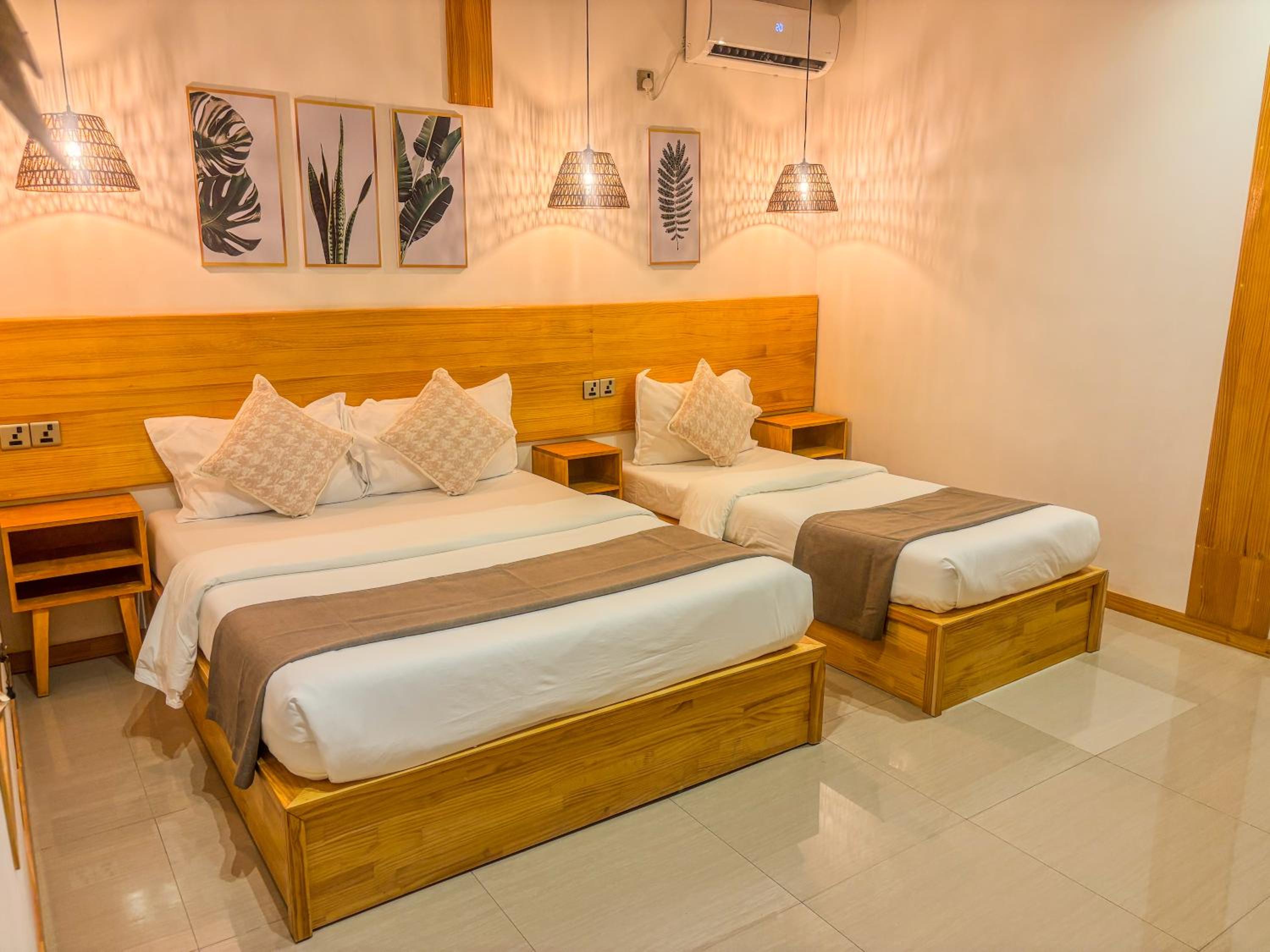 Eco Palm Mathiveri - Guest House with Complimentary Shared Kitchen & Laundry