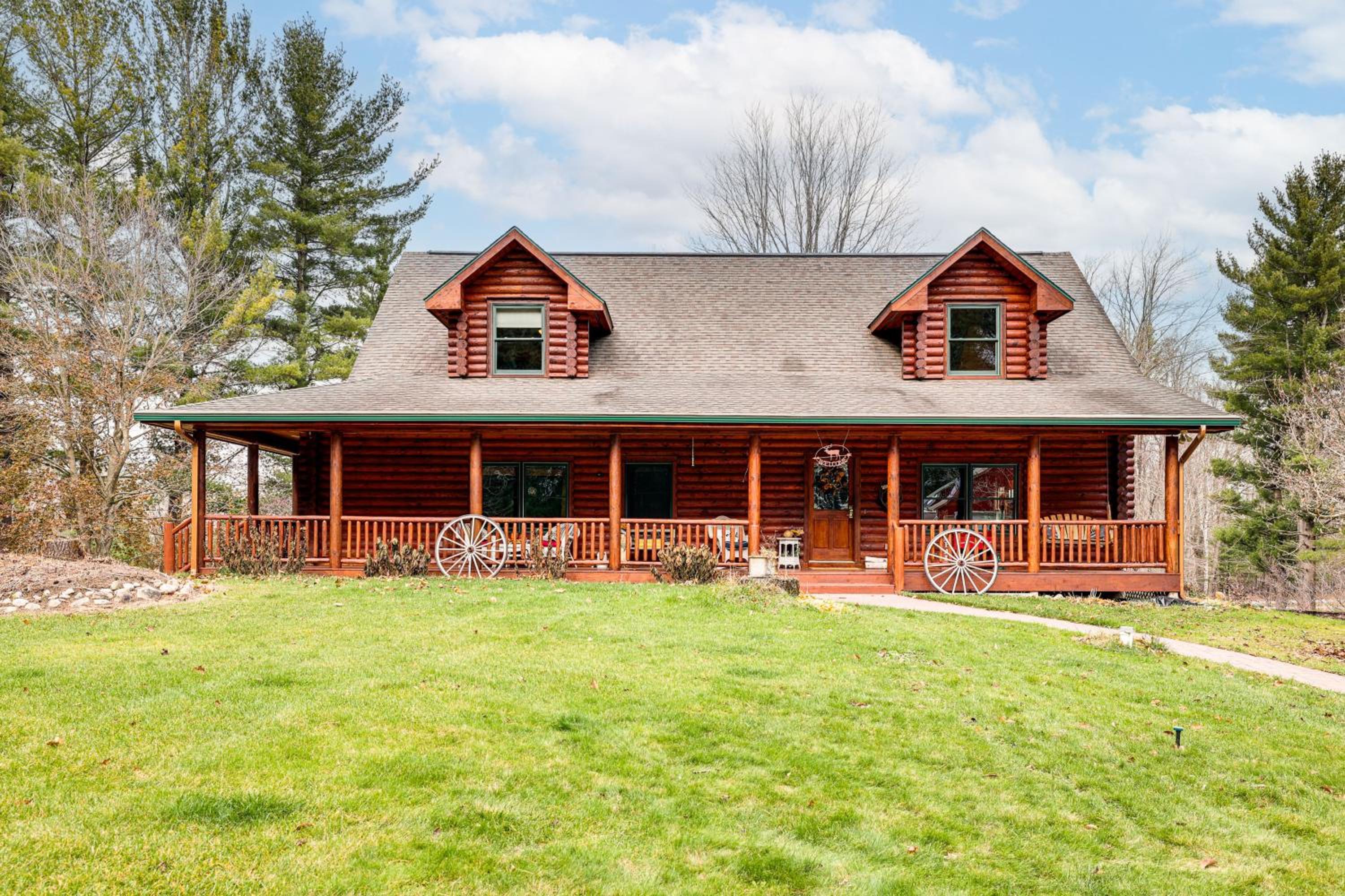 Spacious Log Home with 13 Acres, Ponds and Fire Pit!