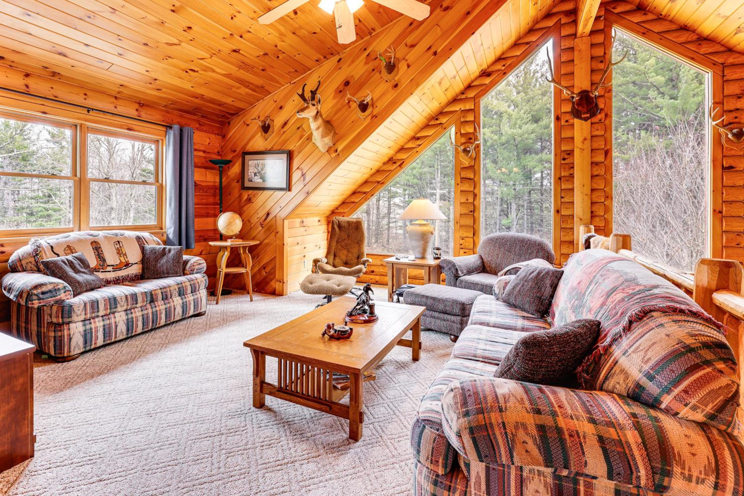 Spacious Log Home with 13 Acres, Ponds and Fire Pit!