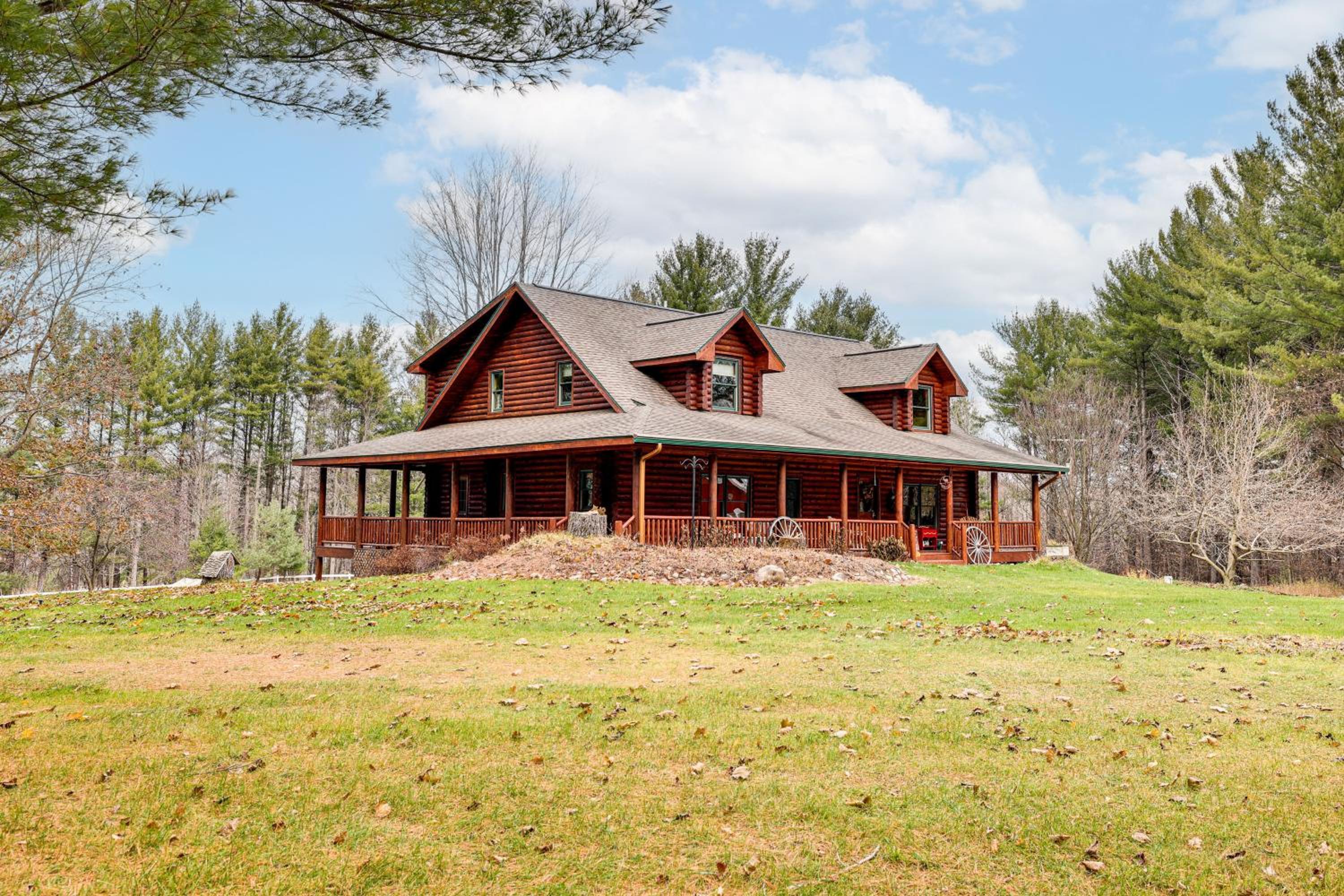 Spacious Log Home with 13 Acres, Ponds and Fire Pit!