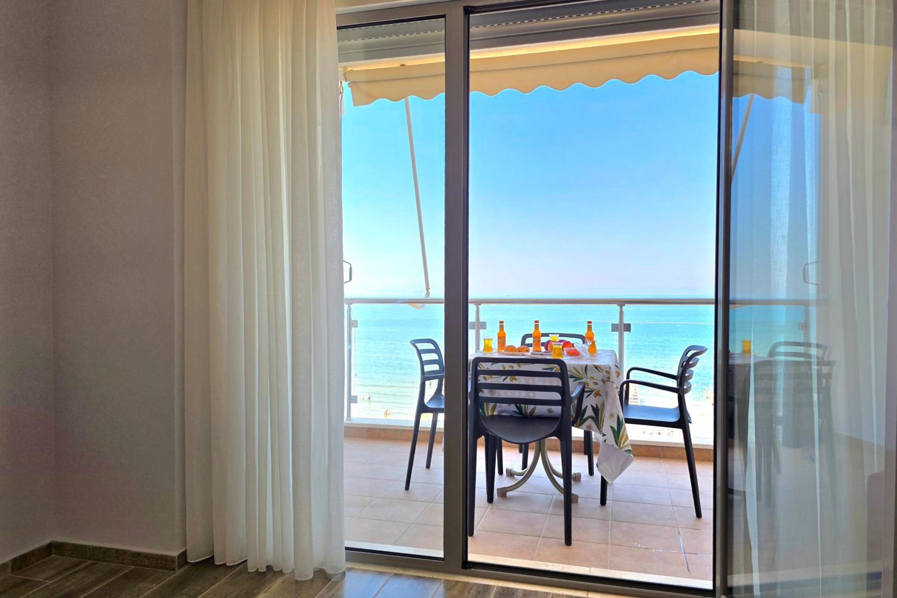 Beachfront & Sea View Apartment 101 - Happy Rentals