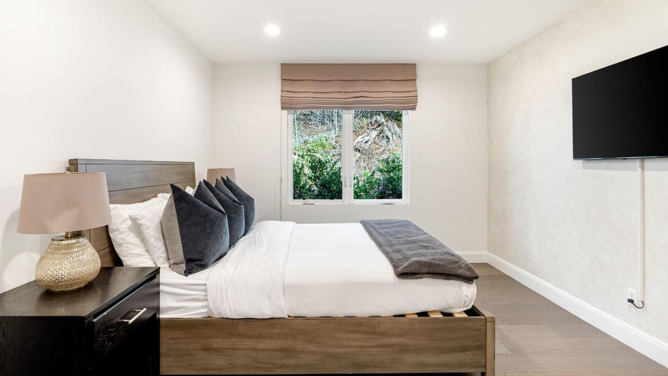 LA Hillside Retreat w Pool Views Fire Pit Outdoor Lounging Casa Bellagio by AvantStay