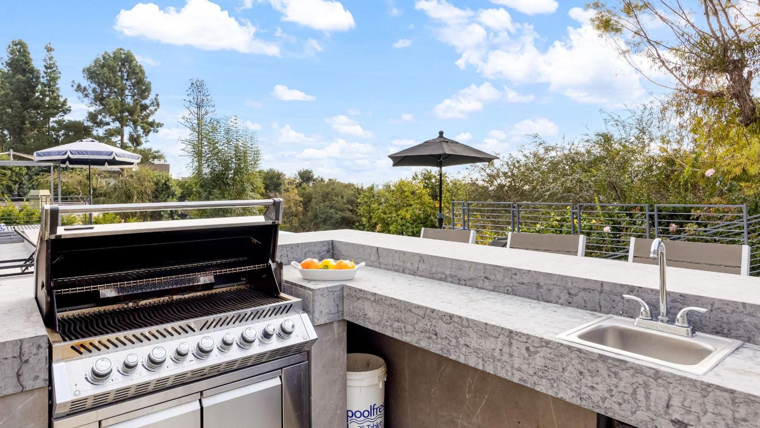 LA Hillside Retreat w Pool Views Fire Pit Outdoor Lounging Casa Bellagio by AvantStay