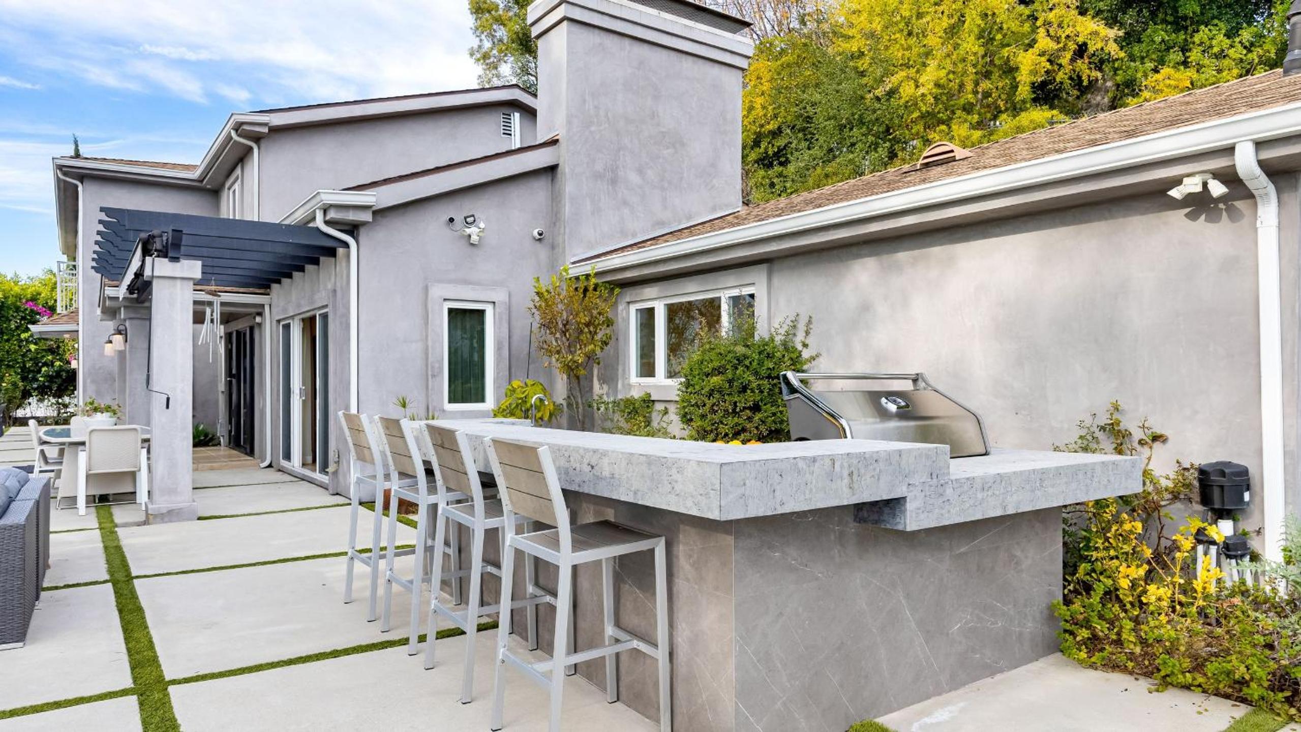 LA Hillside Retreat w Pool Views Fire Pit Outdoor Lounging Casa Bellagio by AvantStay