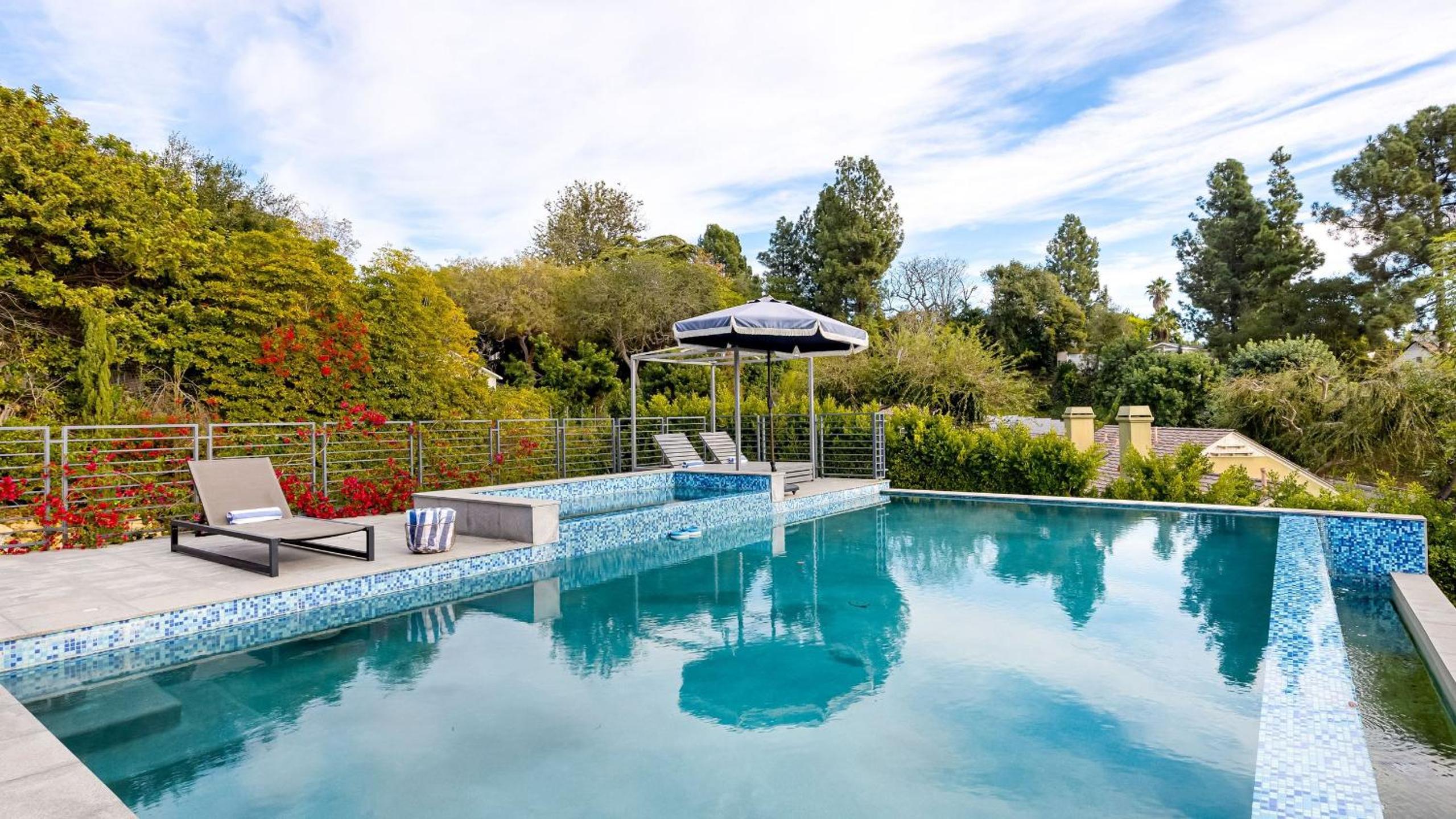 LA Hillside Retreat w Pool Views Fire Pit Outdoor Lounging Casa Bellagio by AvantStay