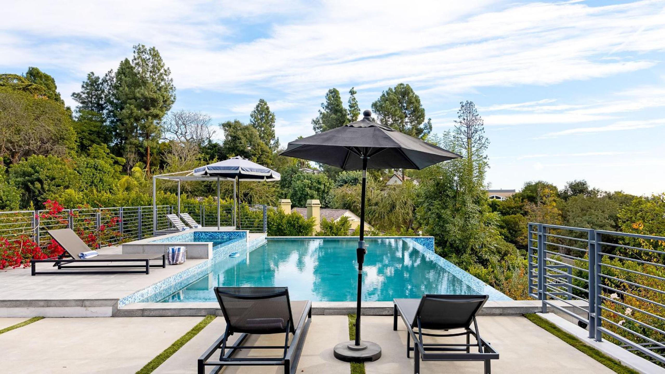 LA Hillside Retreat w Pool Views Fire Pit Outdoor Lounging Casa Bellagio by AvantStay