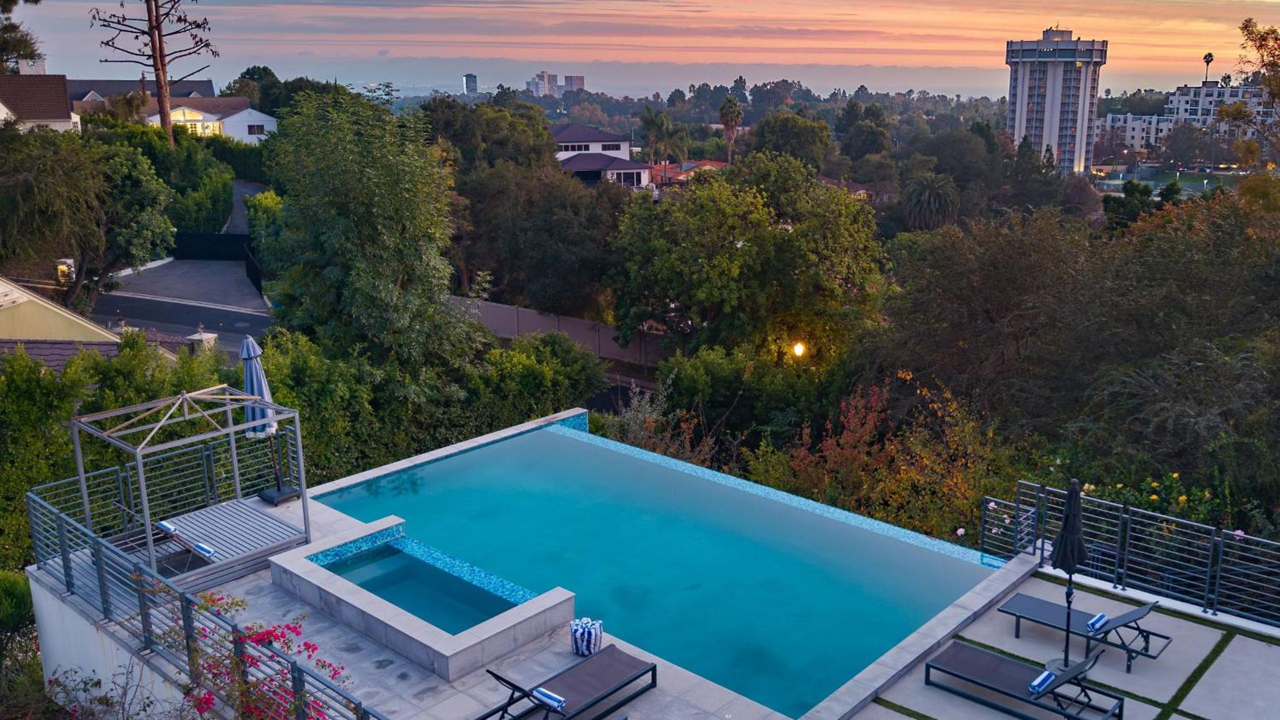 LA Hillside Retreat w Pool Views Fire Pit Outdoor Lounging Casa Bellagio by AvantStay