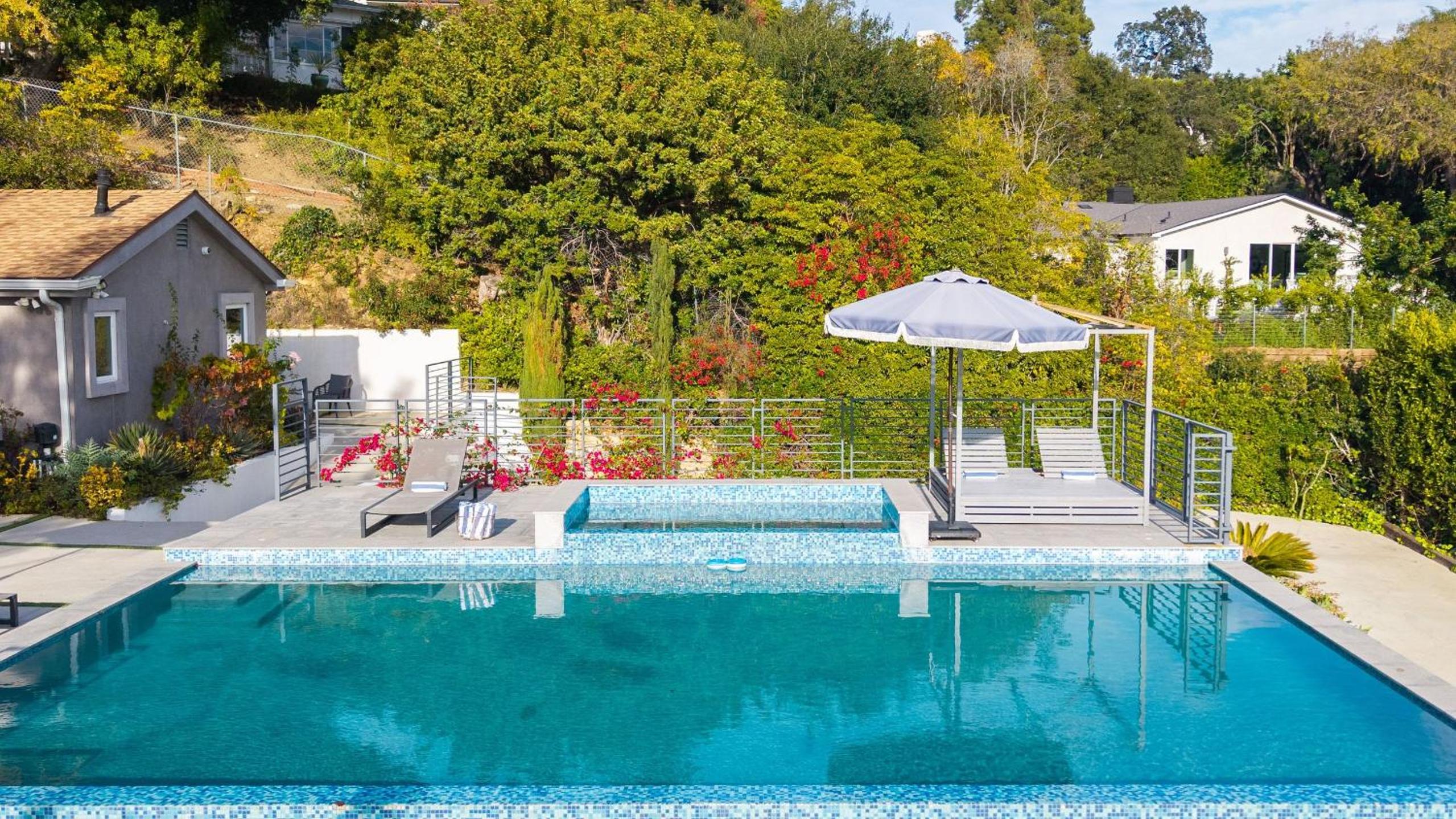 LA Hillside Retreat w Pool Views Fire Pit Outdoor Lounging Casa Bellagio by AvantStay