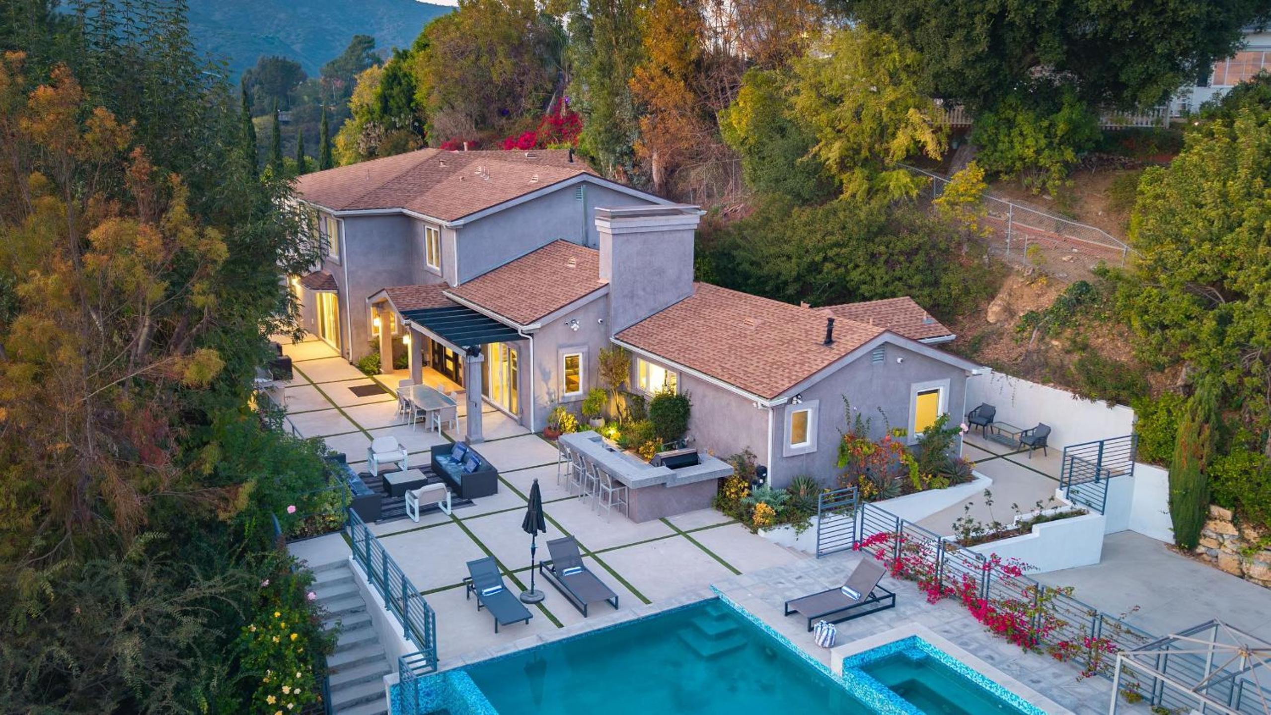 LA Hillside Retreat w Pool Views Fire Pit Outdoor Lounging Casa Bellagio by AvantStay