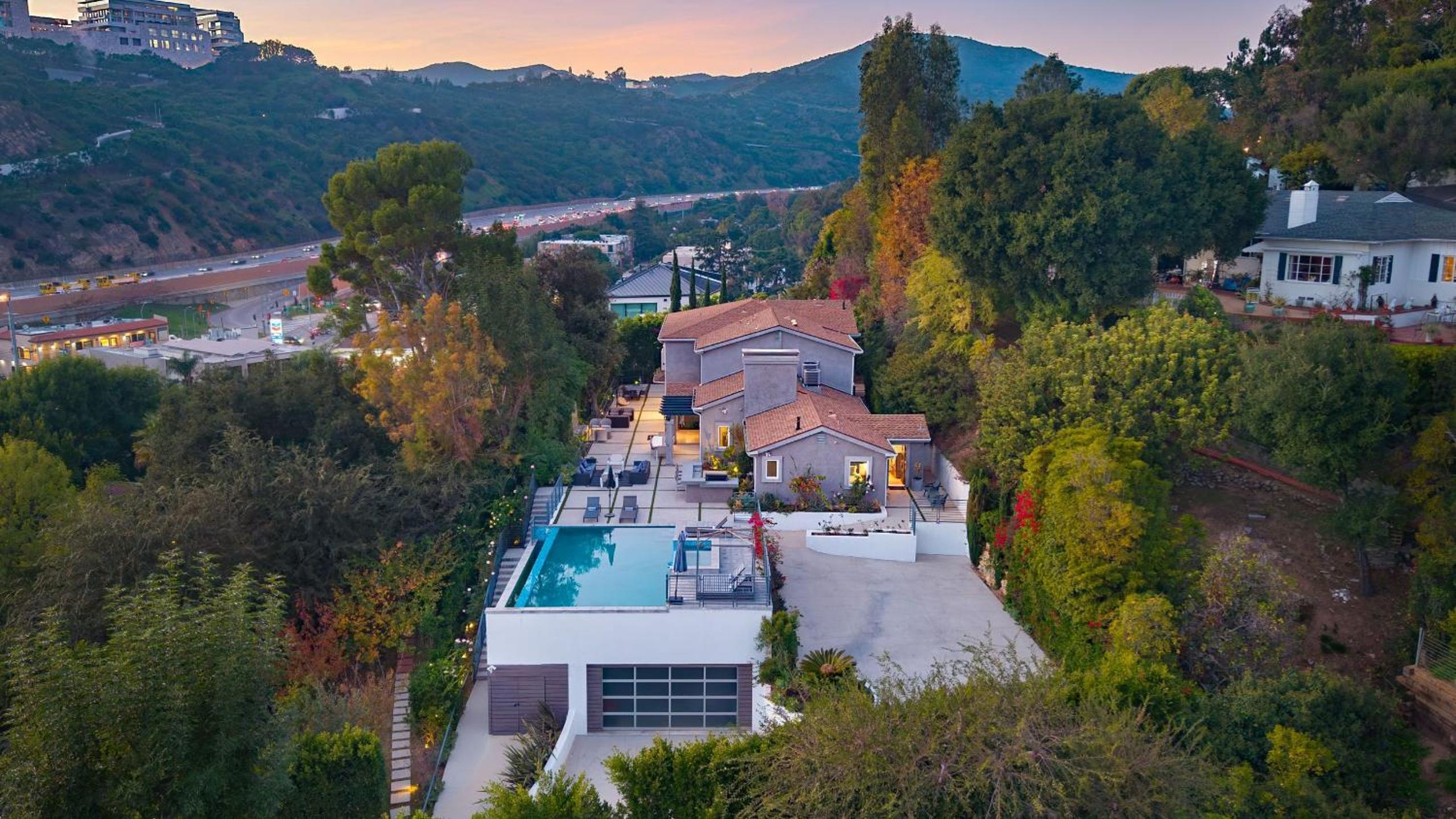 LA Hillside Retreat w Pool Views Fire Pit Outdoor Lounging Casa Bellagio by AvantStay