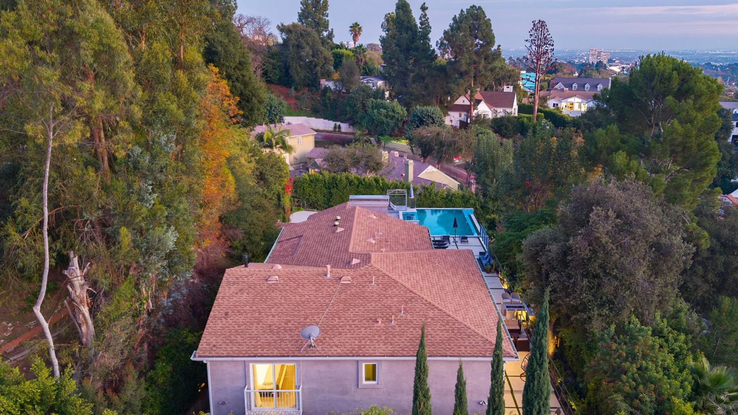 LA Hillside Retreat w Pool Views Fire Pit Outdoor Lounging Casa Bellagio by AvantStay
