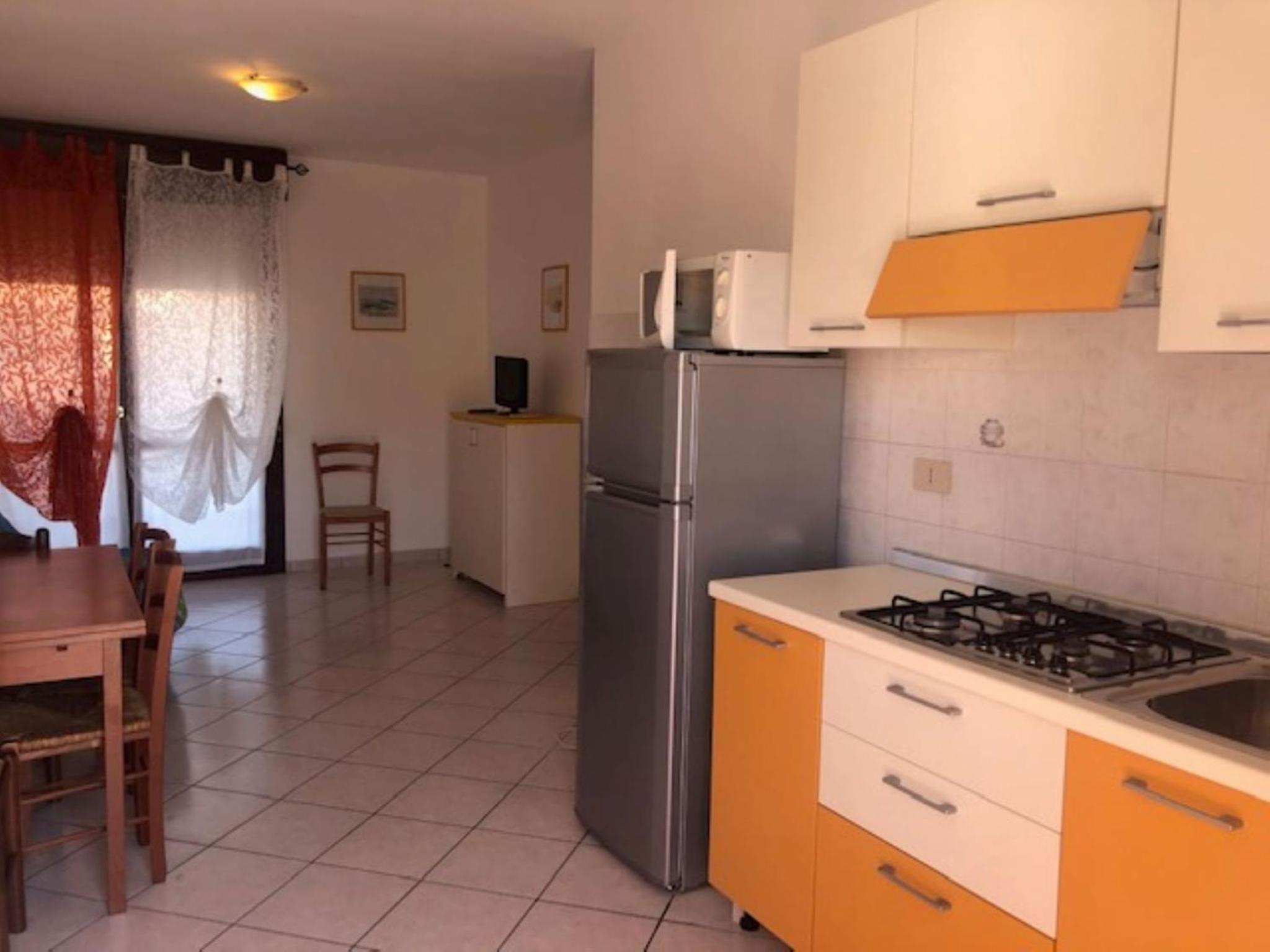 Bright flat in Rosolina with shared pool