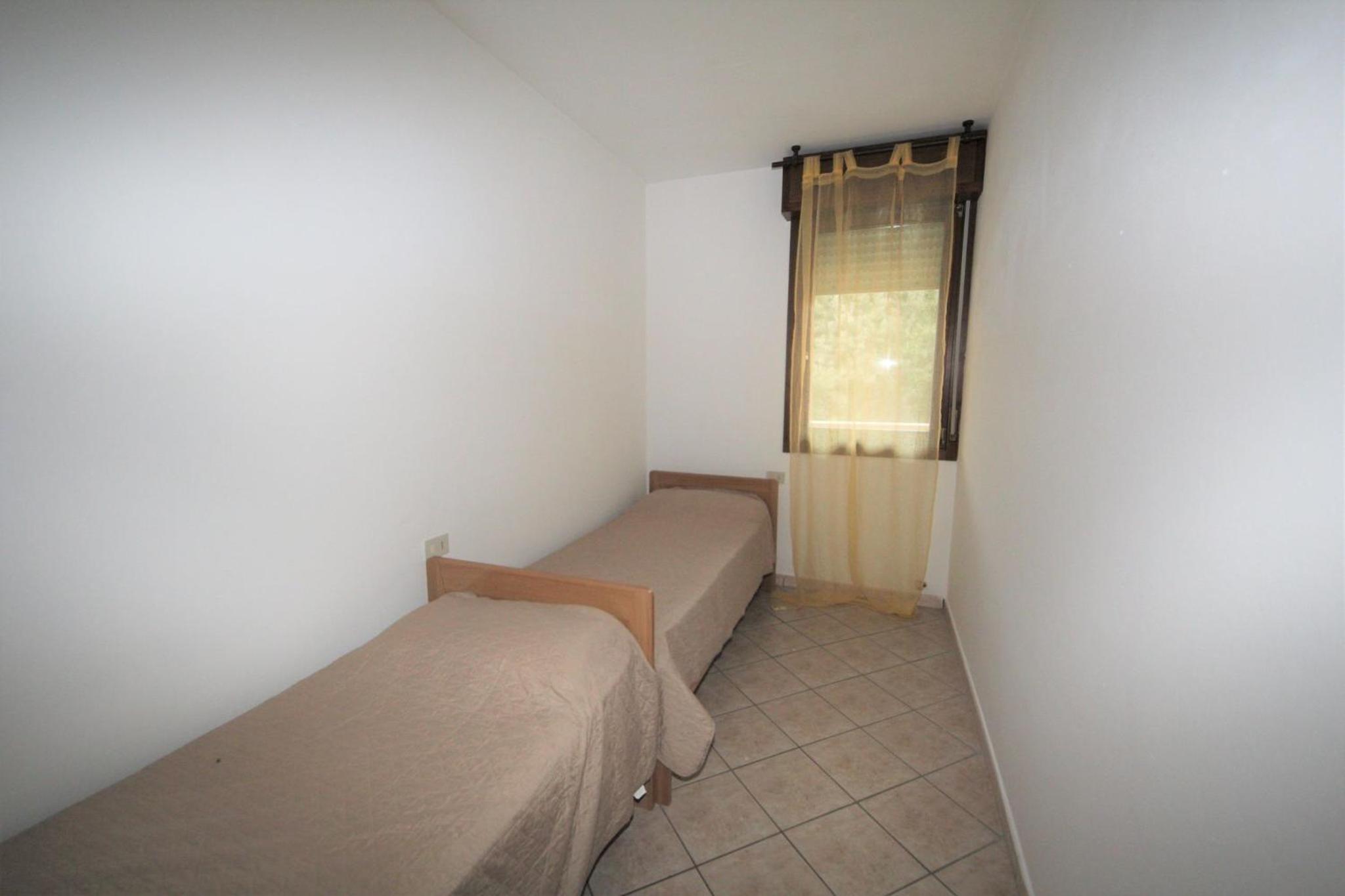 Bright flat in Rosolina with shared pool