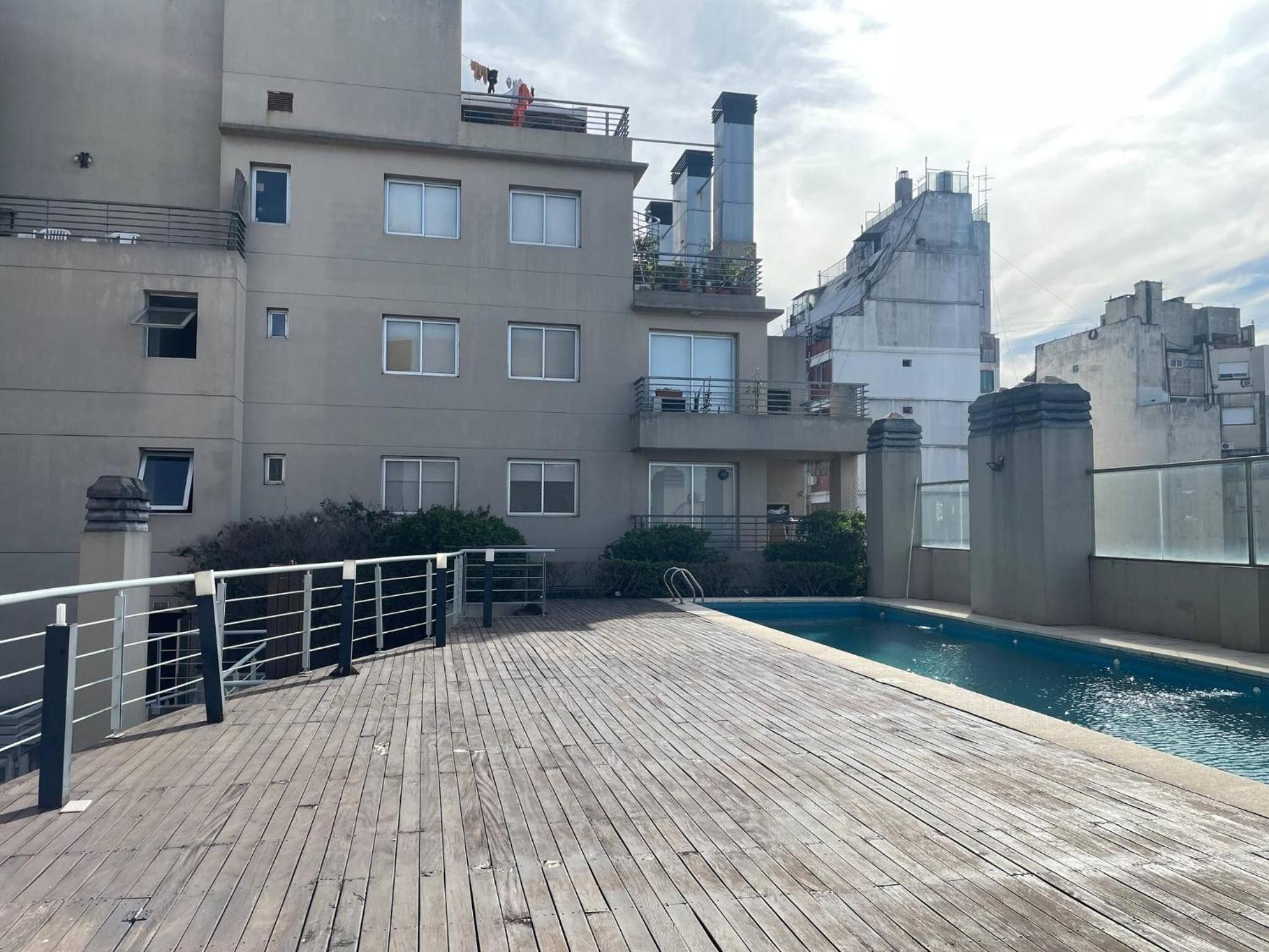 Studio featuring a private terrace with a grill