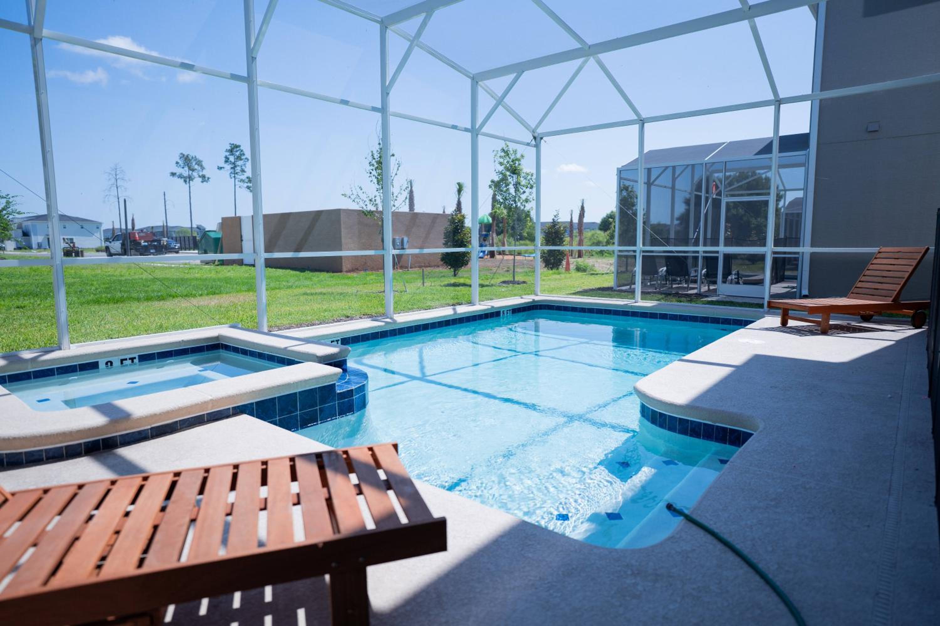 6BR Family at Champions Gate Pool Game Room