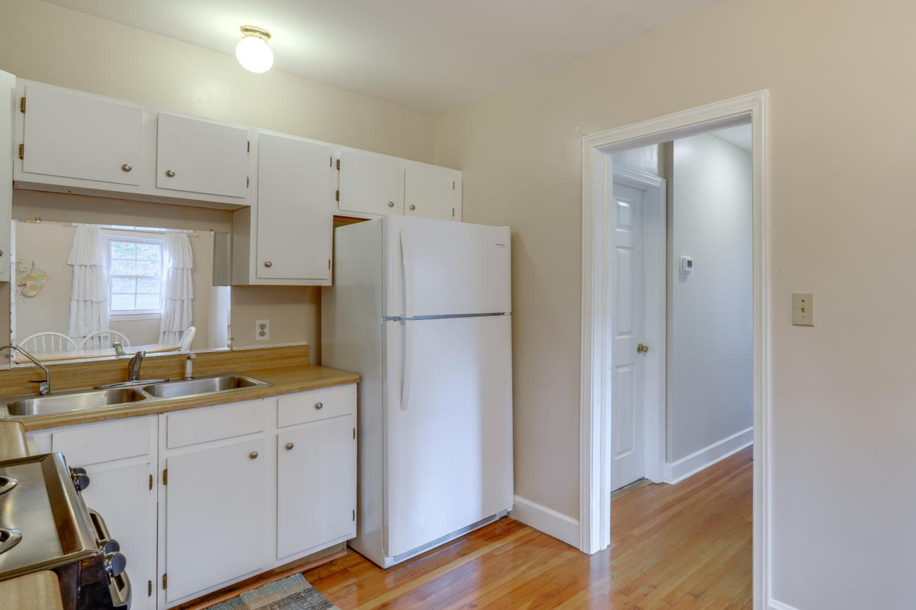 Walk to Shops and Dining Jonesborough Home with Deck!