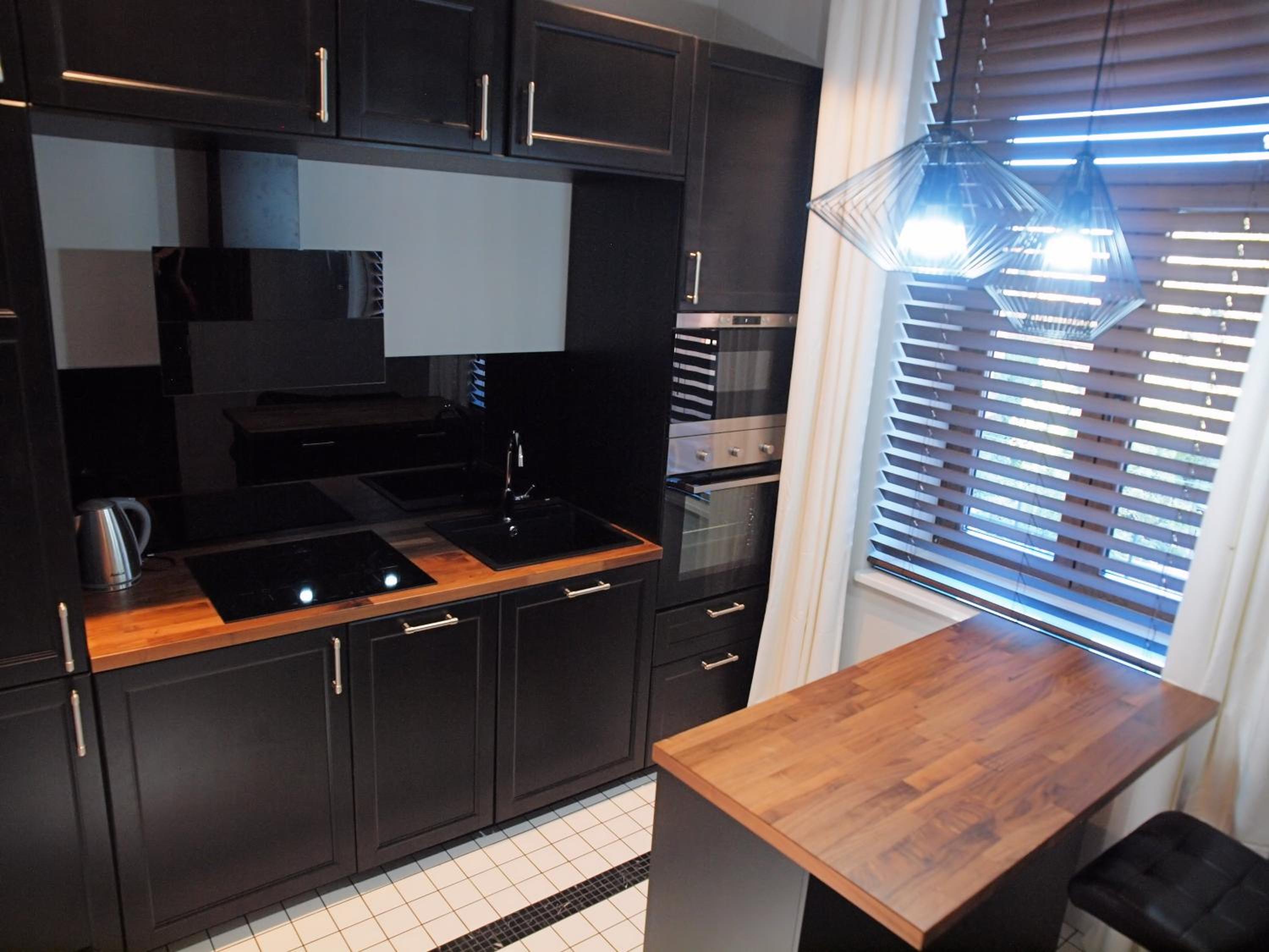 Regis Residence en Bochnia — kitchen