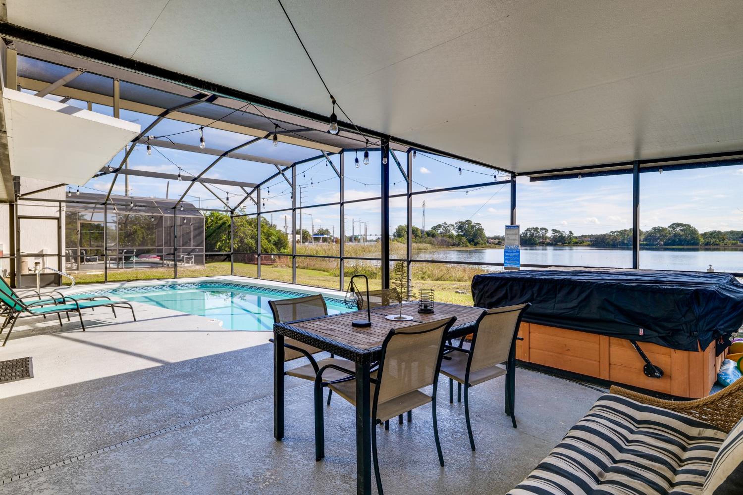 Lakefront Home with Poolside Lounge 11 Mi to Disney