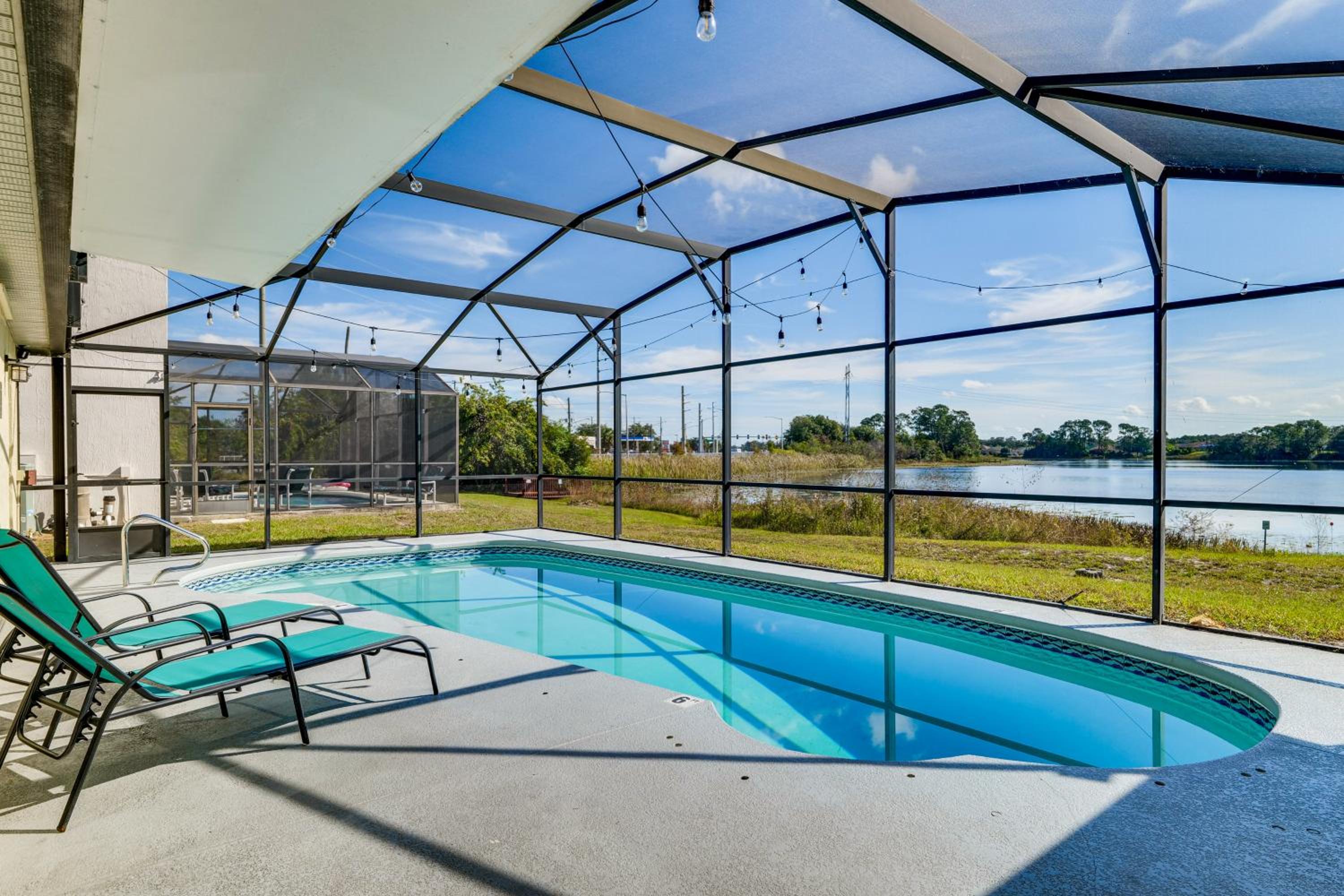 Lakefront Home with Poolside Lounge 11 Mi to Disney