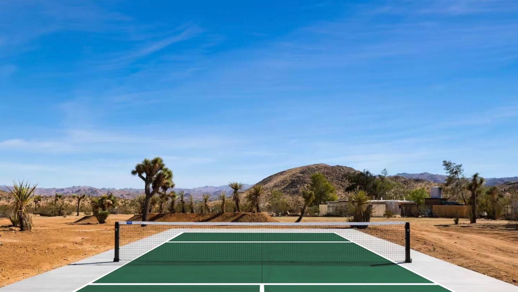 Iconic 6BR Desert Retreat w Pool Pickleball Fire Pit Joshua Tree Mansion by AvantStay