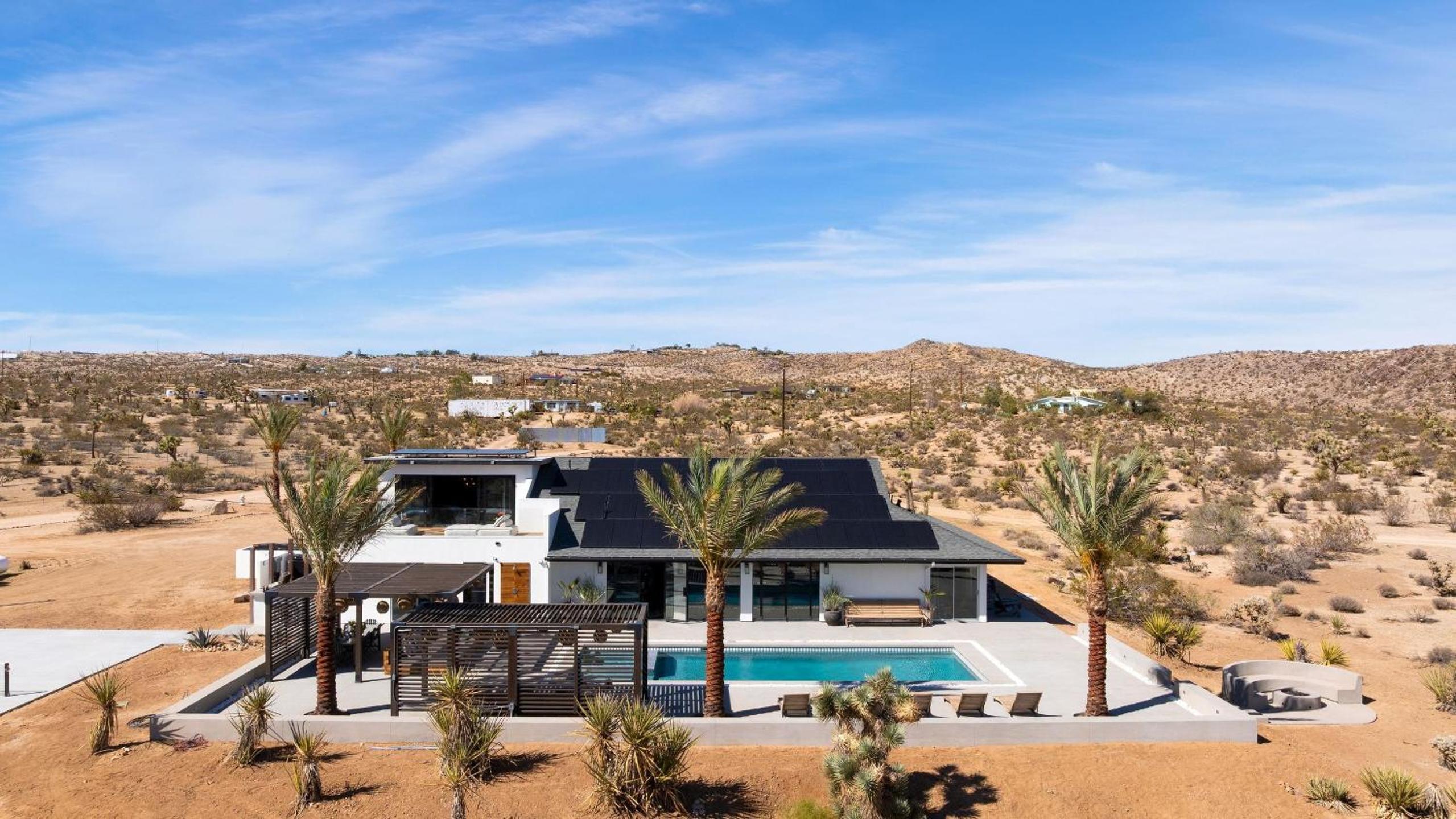 Iconic 6BR Desert Retreat w Pool Pickleball Fire Pit Joshua Tree Mansion by AvantStay
