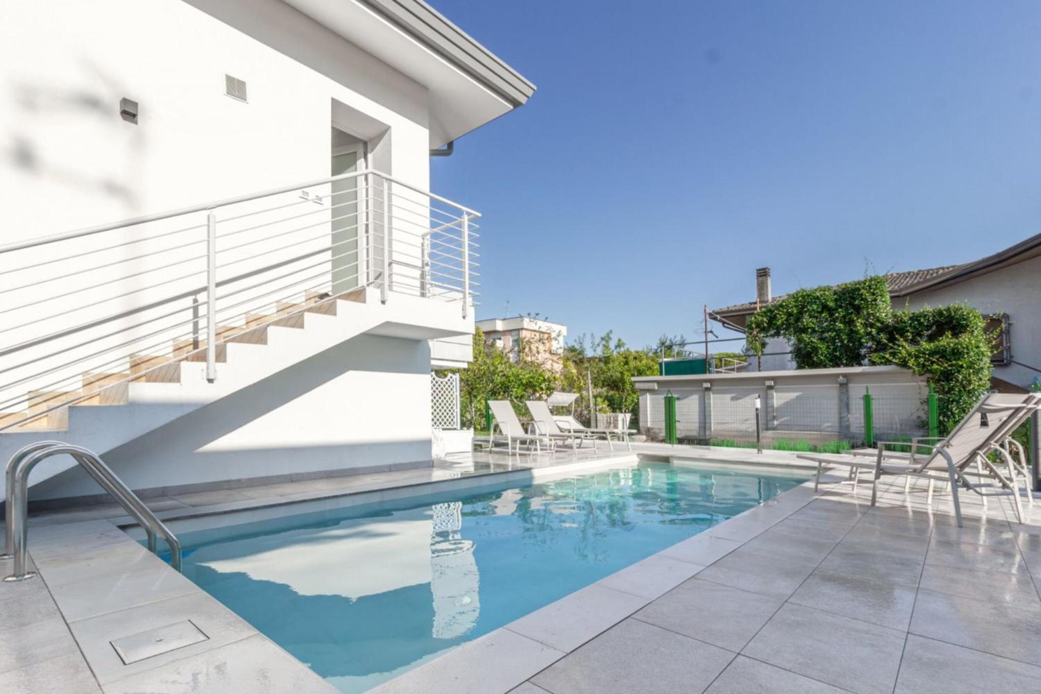Modern apartment with shared pool and terrace