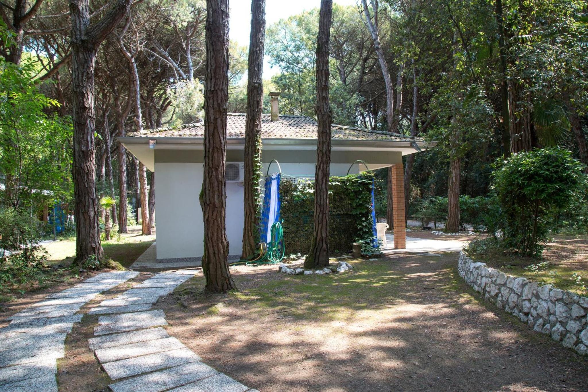 Pine-front bungalow steps from the beach