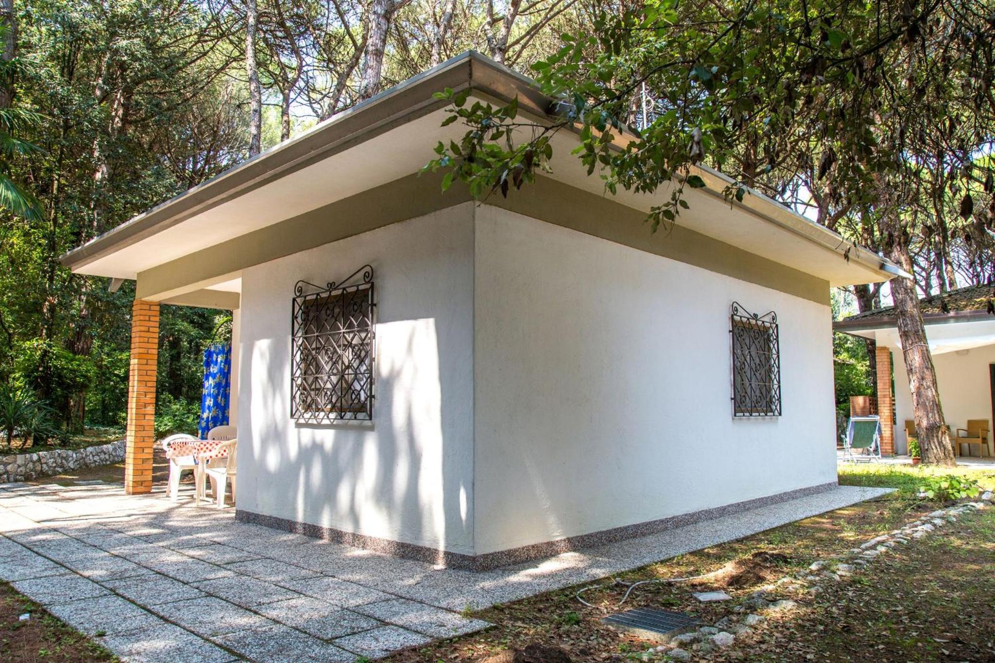 Pine-front bungalow steps from the beach